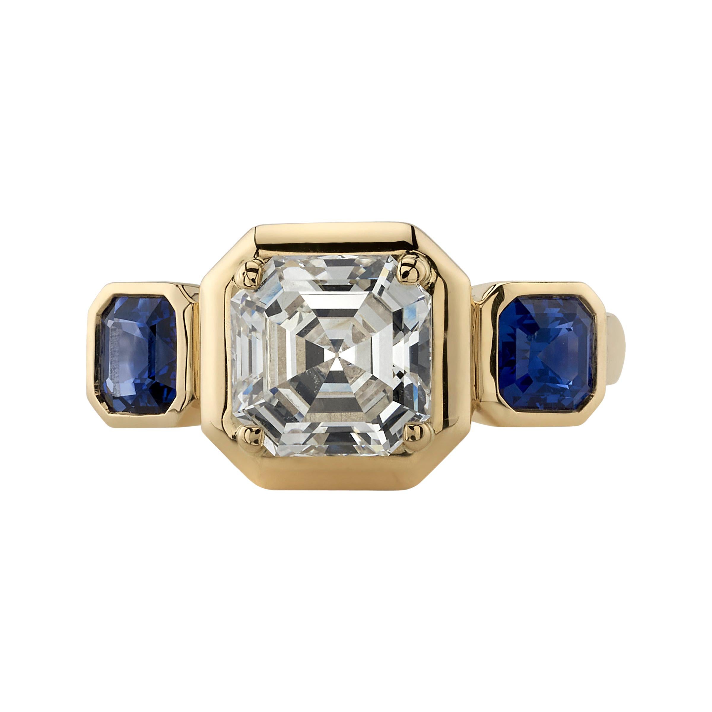 2.05 Carat Asscher Cut Diamond Set in a Handcrafted Three Stone Yellow Gold Ring