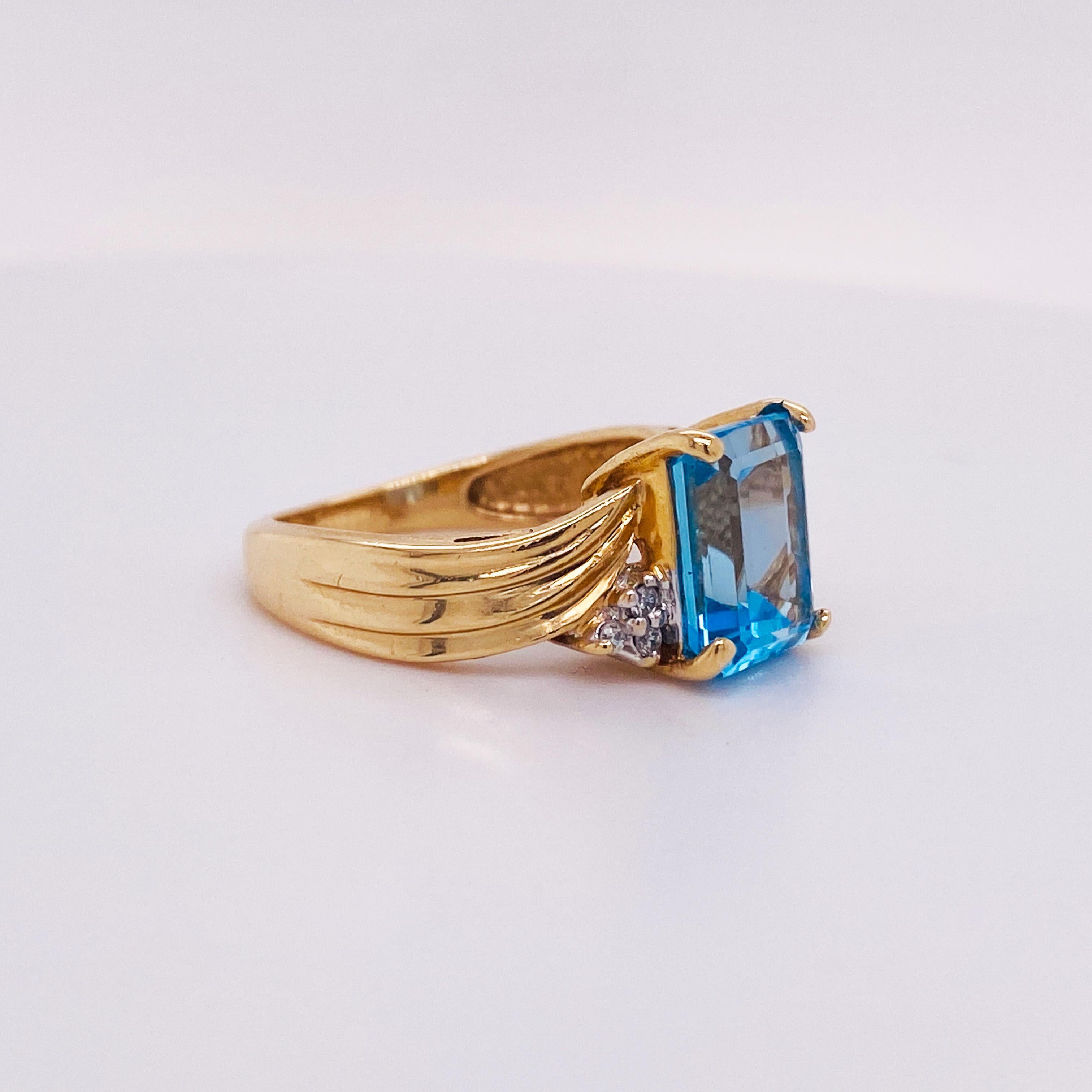 Contemporary 2.05 Carat Bright Ocean Blue Topaz, 14k Gold Wave Ring with Diamond Accents For Sale