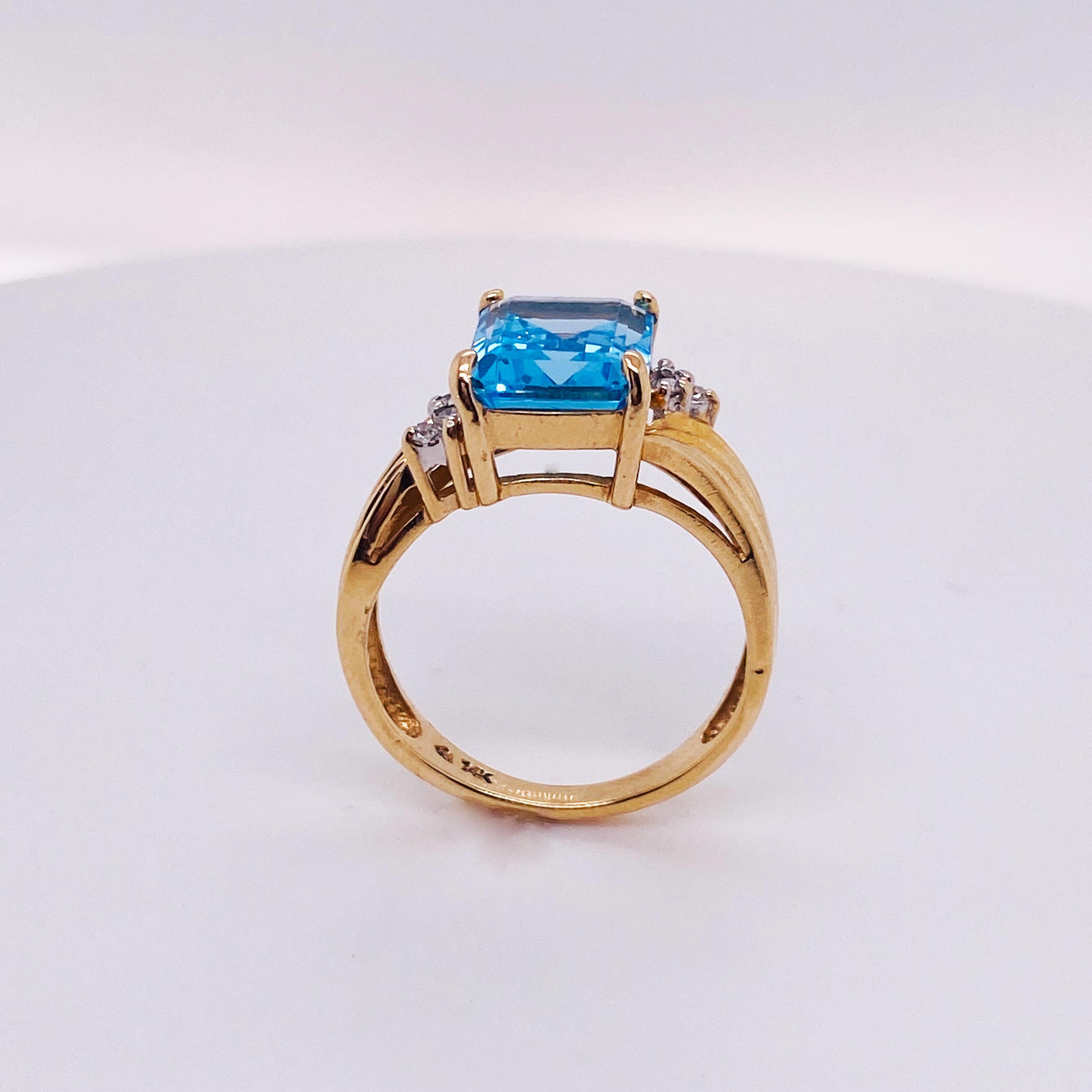 Emerald Cut 2.05 Carat Bright Ocean Blue Topaz, 14k Gold Wave Ring with Diamond Accents For Sale