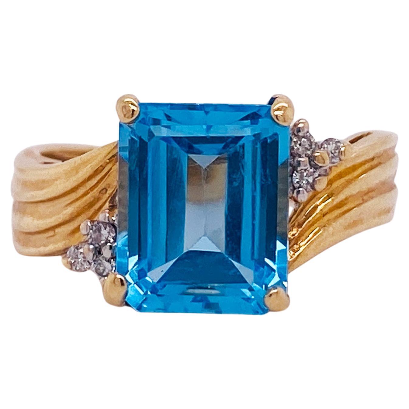 2.05 Carat Bright Ocean Blue Topaz, 14k Gold Wave Ring with Diamond Accents For Sale
