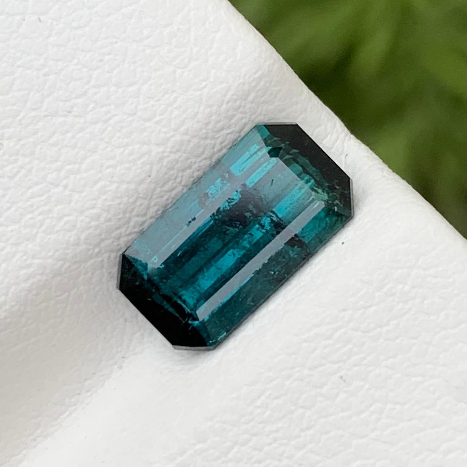 Loose Indicolite Tourmaline 
Weight: 2.05 Carats 
Dimension: 10.3 x 5.7 x 4 Mm
Origin: Afghanistan 
Colour: Blue 
Treatment: Non 
Certificate: On Demand 
Clarity : Included 
Shape: Emerald 

Indicolite tourmaline, also known simply as indicolite, is