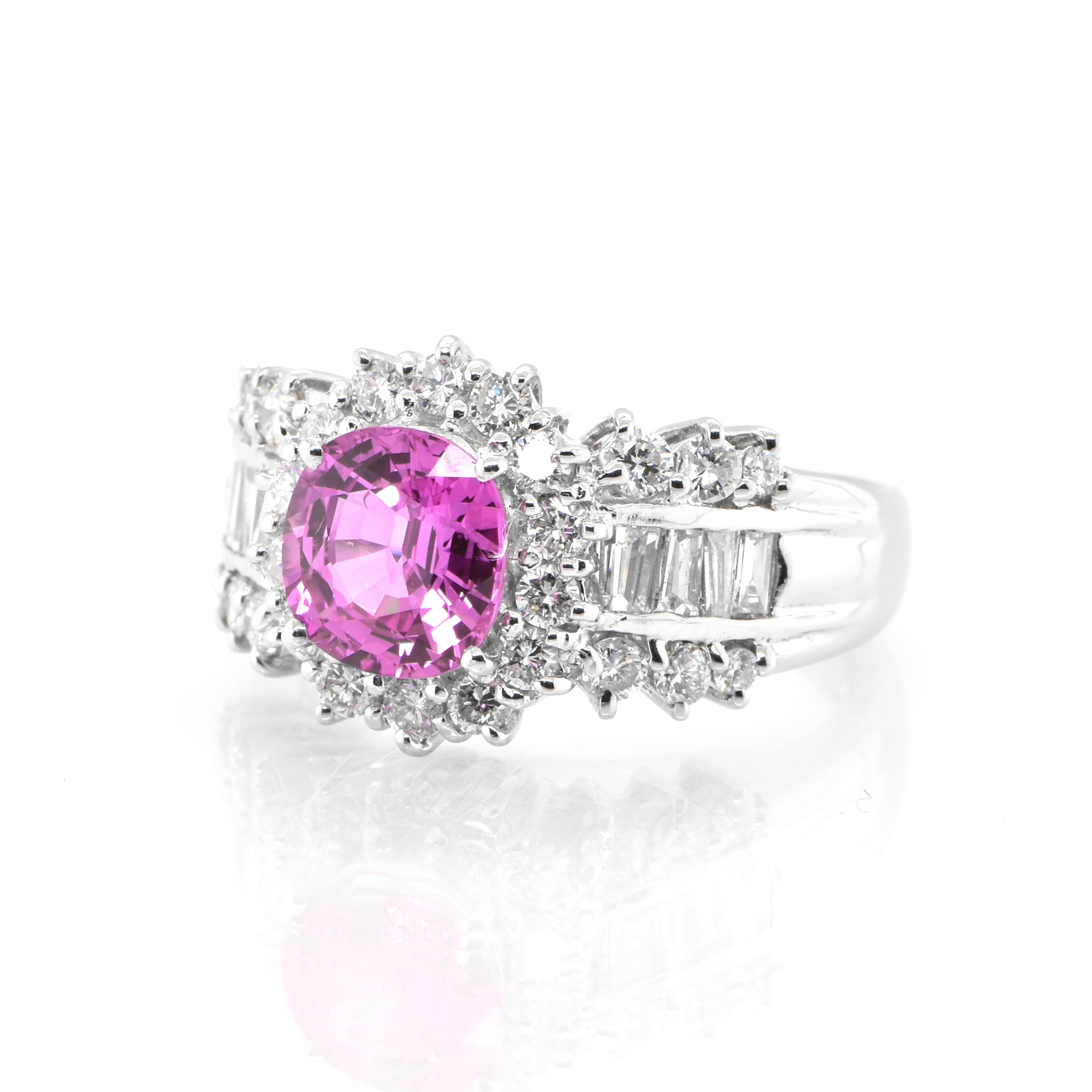 An elegant Cocktail ring with a 2.05 Carat, Natural Pink Sapphire and 1.33 Carats of Diamond Accents set in Platinum. Sapphires have extraordinary durability - they excel in hardness as well as toughness and durability making them very popular in