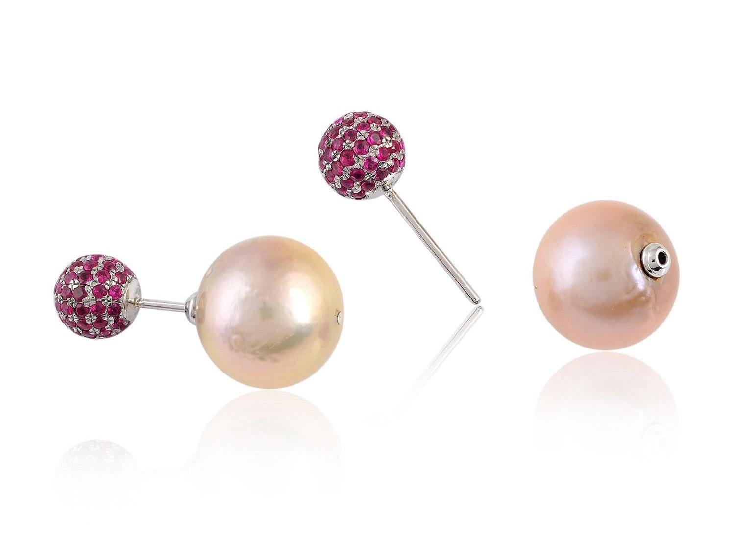 Handcrafted from 18-karat gold and sterling silver, this stud earrings is set with 2.05 carats ruby and 39 carats of pearl.

FOLLOW  MEGHNA JEWELS storefront to view the latest collection & exclusive pieces.  Meghna Jewels is proudly rated as a Top