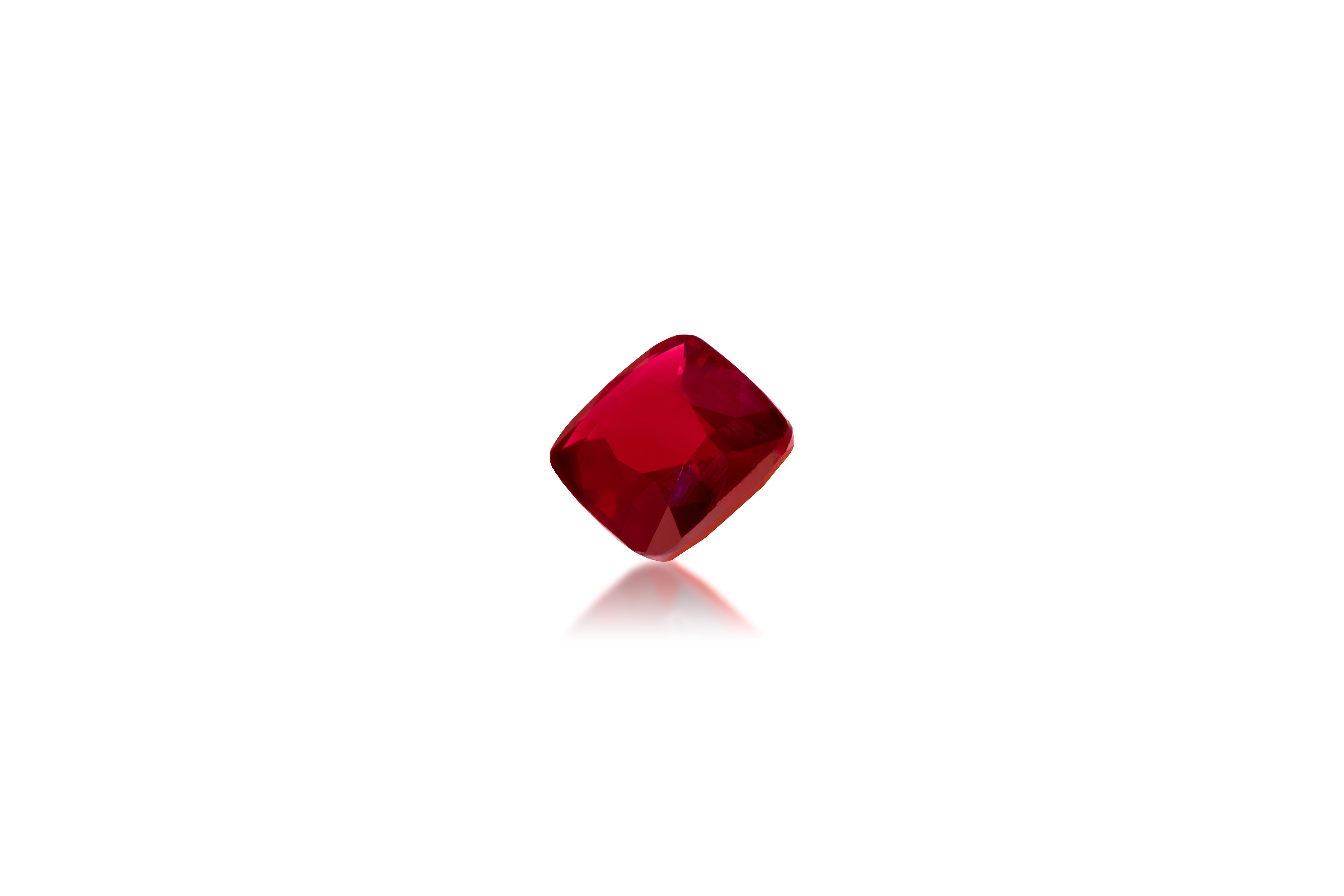 Sapphire: Vivid Red Ruby
Origin: Mozambique
Shape: Rectangular Cushion
Carat Weight: 2.05 cts
Dimensions: 8.21 x 7.03 x 3.38 mm

This beautiful Natural Vivid Red Ruby has a natural red color and is unheated.
It is clean and nicely faceted and