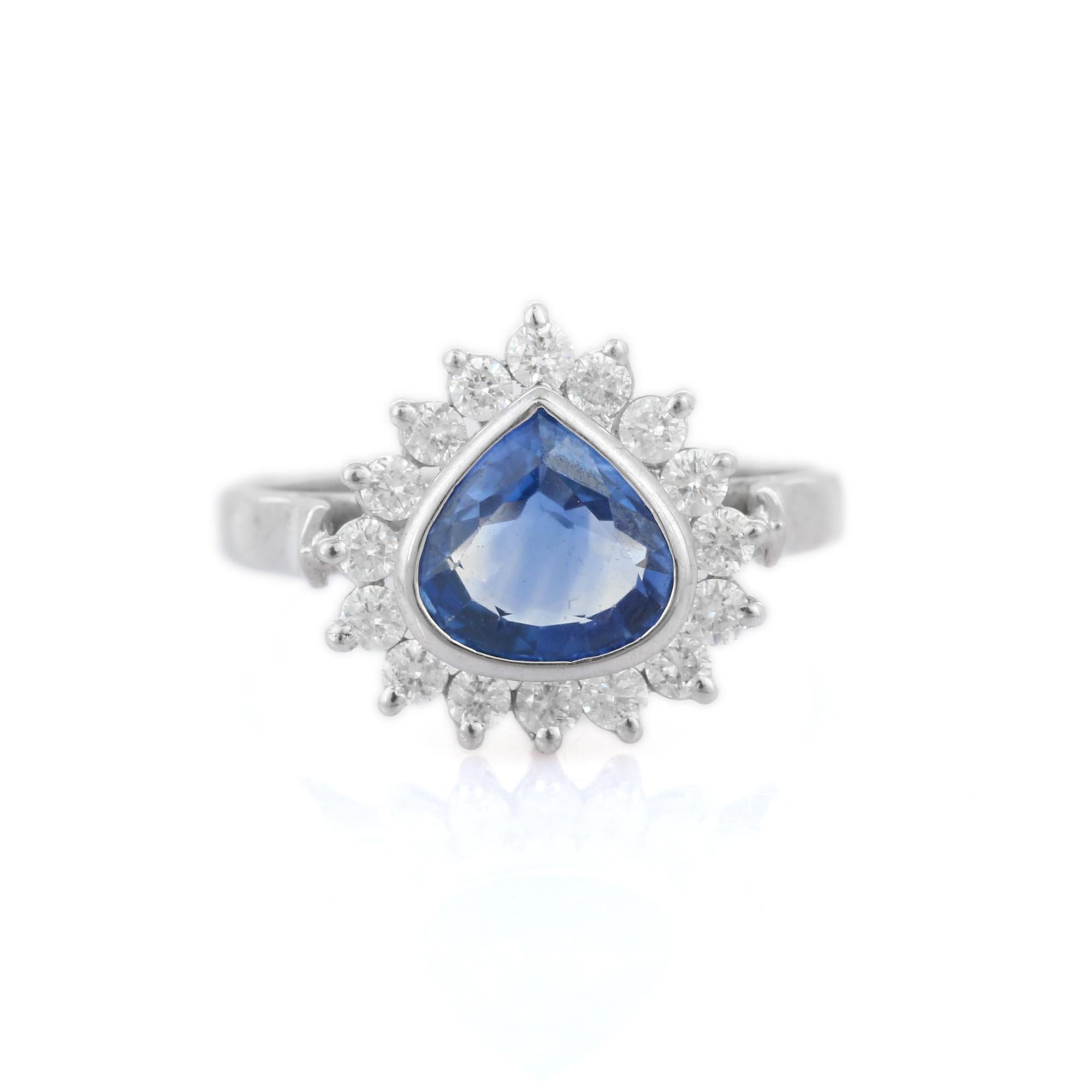 For Sale:  2.05 ct Blue Sapphire and Diamond Halo Engagement Ring in 18K White Gold 6
