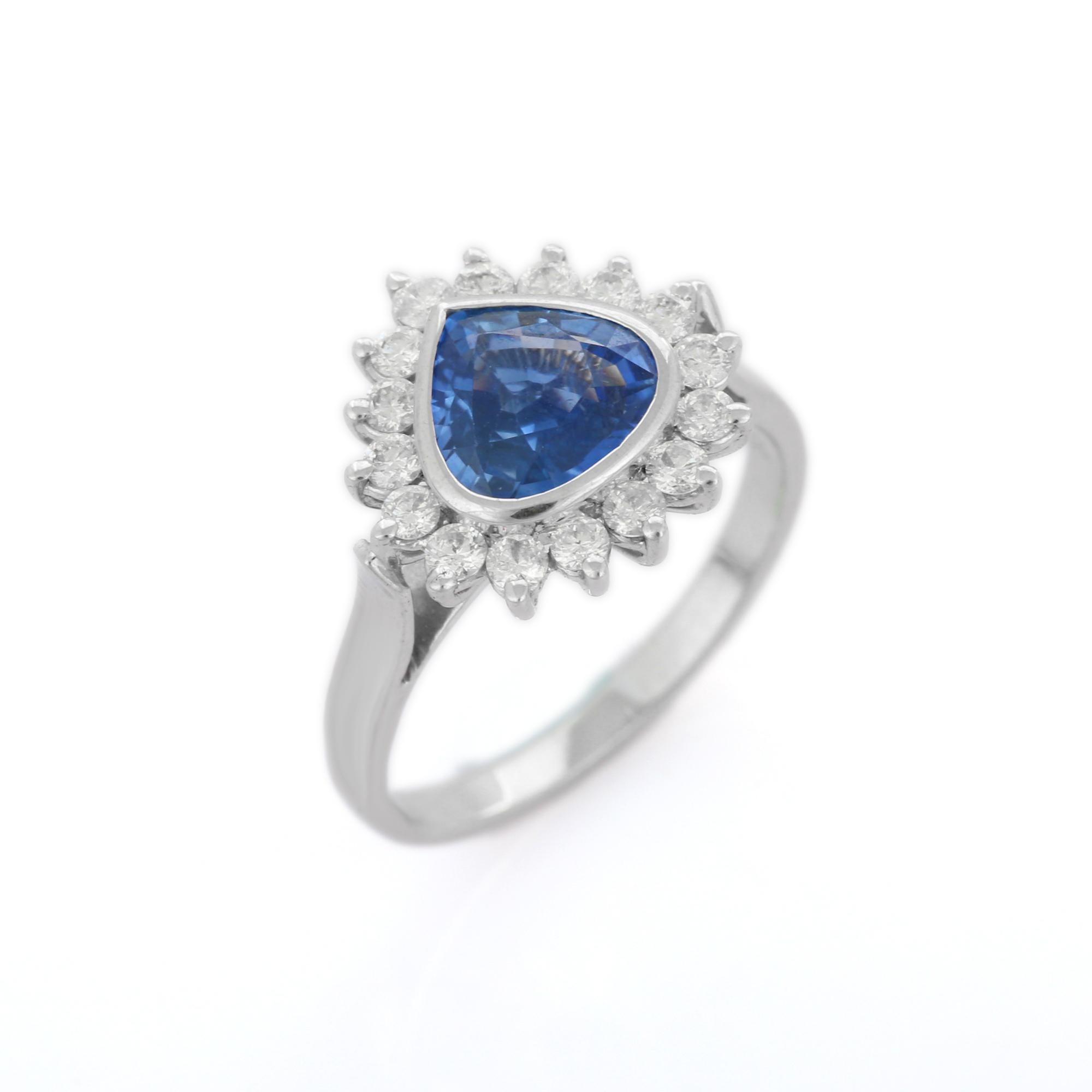 For Sale:  2.05 ct Blue Sapphire and Diamond Halo Engagement Ring in 18K White Gold 7