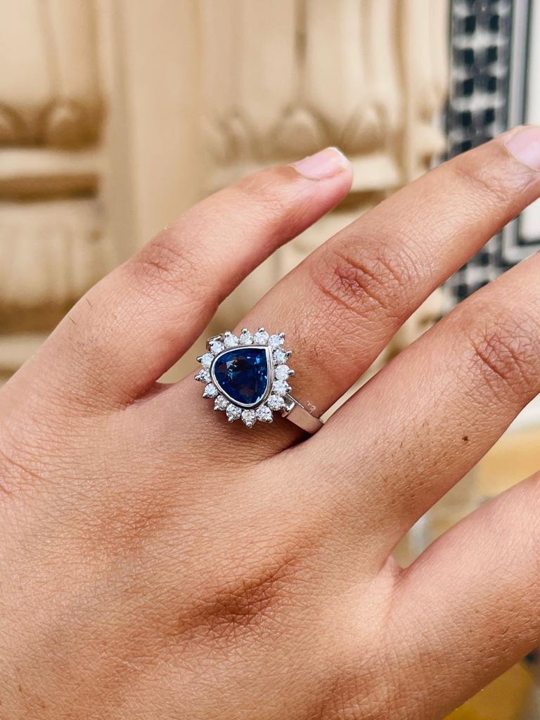 For Sale:  2.05 ct Blue Sapphire and Diamond Halo Engagement Ring in 18K White Gold 5