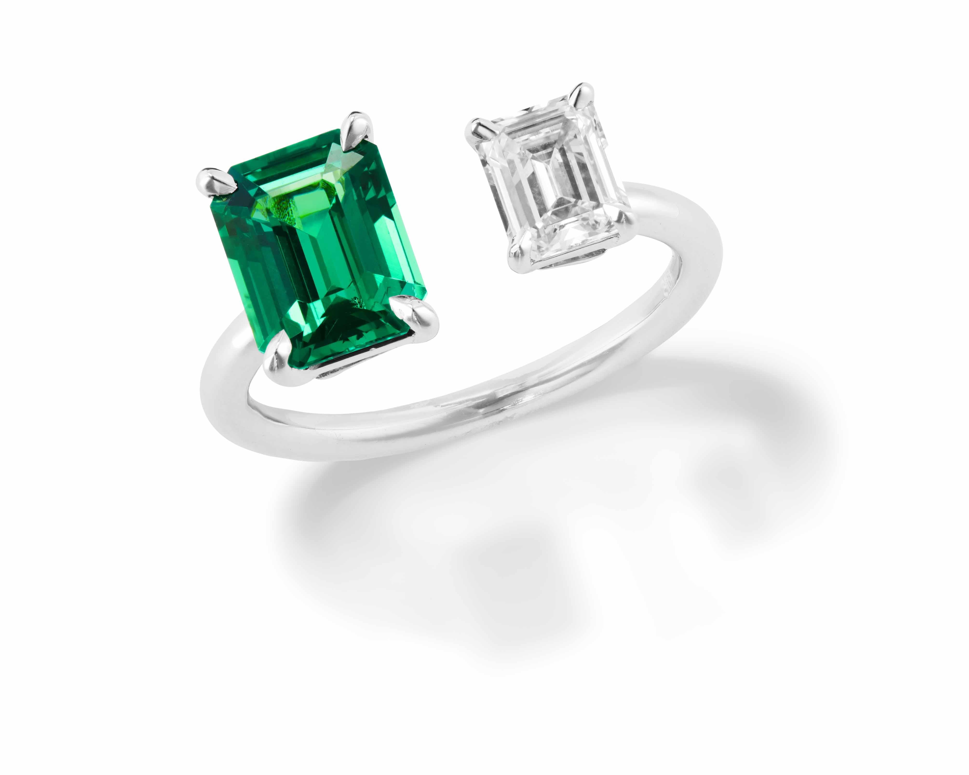 Elevate your look with a pop of color from Tsavorite and Diamond Open ring. 

2.05 ct emerald-cut Tsavorite* and 0.69 ct emerald-cut J VS1 diamond. Handcrafted in 18k white gold, the ring is designed to be worn alone or layered and mixed for a chic