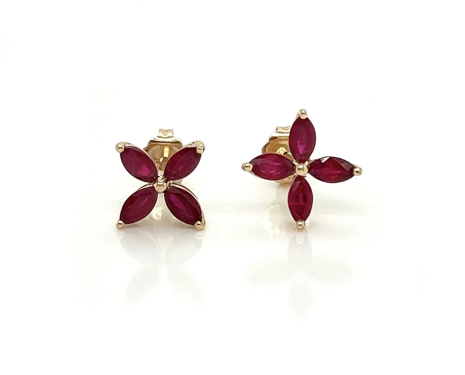 2.05 Total Carat Ruby Flower Motif Pushback Earrings in 14K Yellow Gold

Amazing pair of earrings excellently handmade. These deep red marquise cut rubies will draw all eyes on you. These ruby 