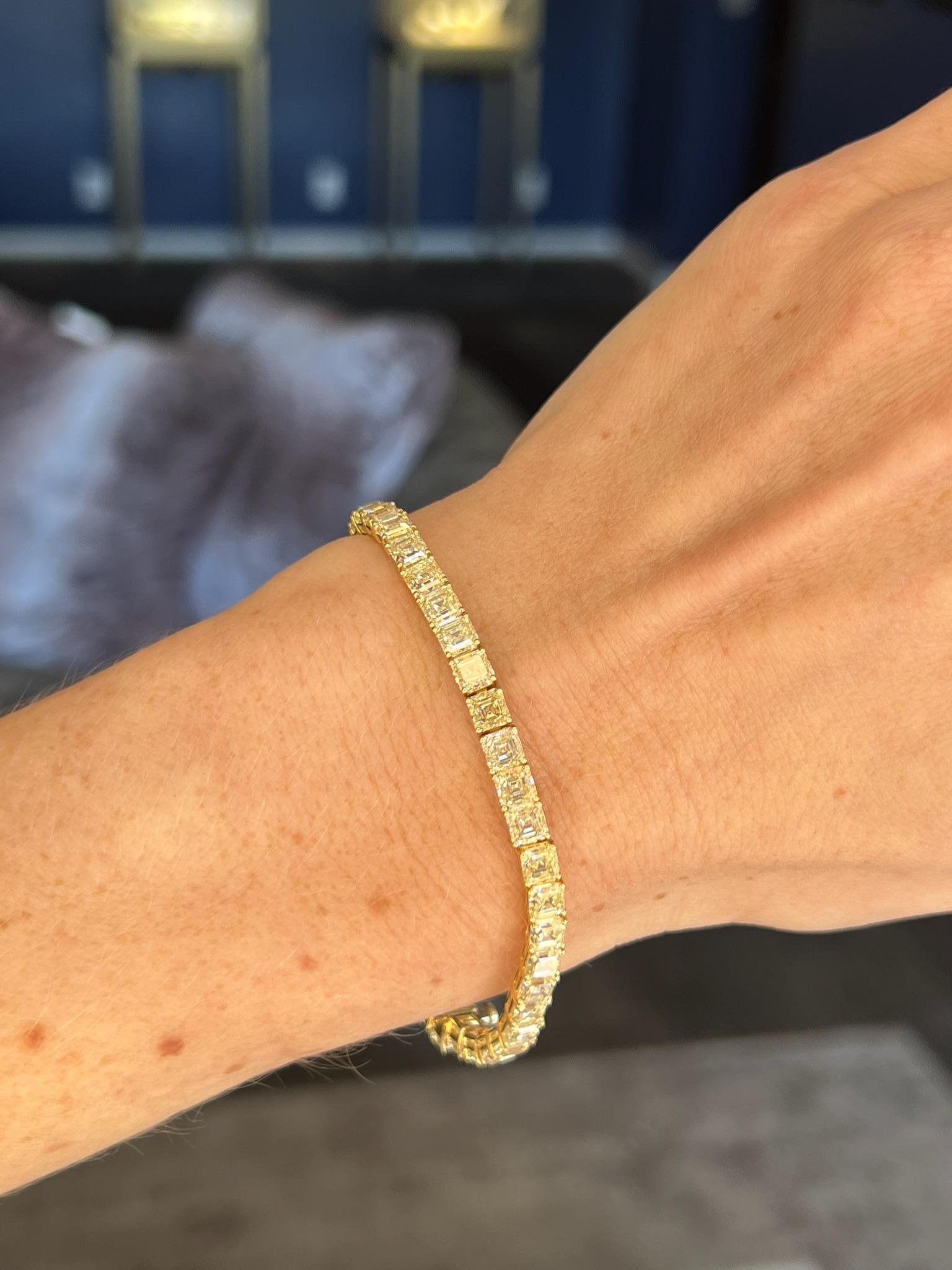Introducing our stunning Asscher Cut Yellow Diamond Tennis bracelet, This exceptional bracelet features a total of 40 exquisite Asscher cut yellow diamonds, each just over half a carat in size.
Weighing a total of 20.75 carats, this bracelet is a