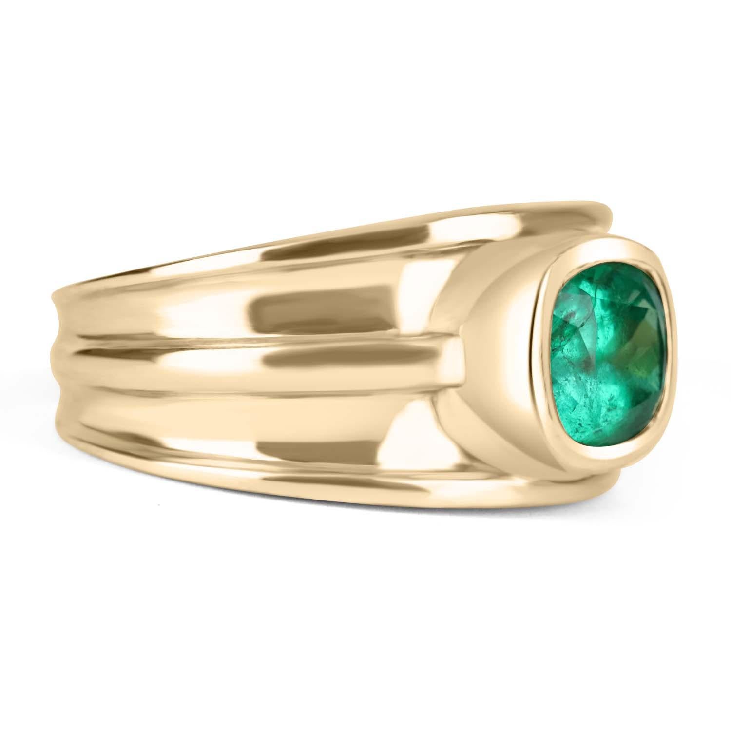 Displayed is a stunning, East to West, Colombian emerald cushion men's ring in 18K yellow gold. This solitaire ring carries a 2.05-carat emerald in a bezel setting. Fully faceted, this gemstone showcases very good shine and beautiful, green color.