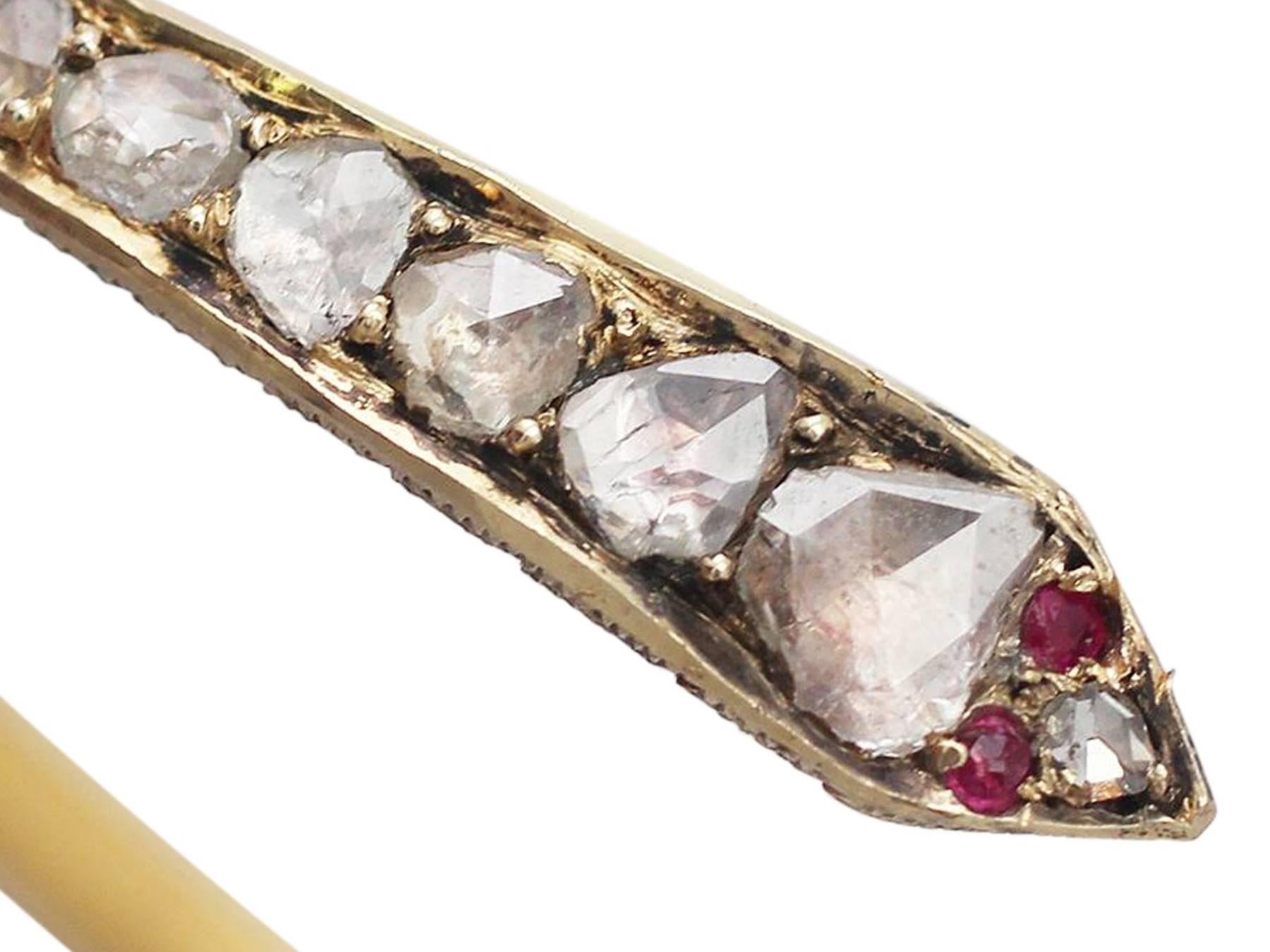 An exceptional antique Egyptian 2.05 carat diamond and 0.03 carat natural ruby, 22 karat yellow gold bangle/armlet in the form of a snake; an addition to our antique jewelry collections

This fine and impressive Egyptian bangle has been crafted in