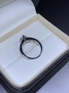 2.05ct Marquise baguette diamond engagement ring in 18k white gold.