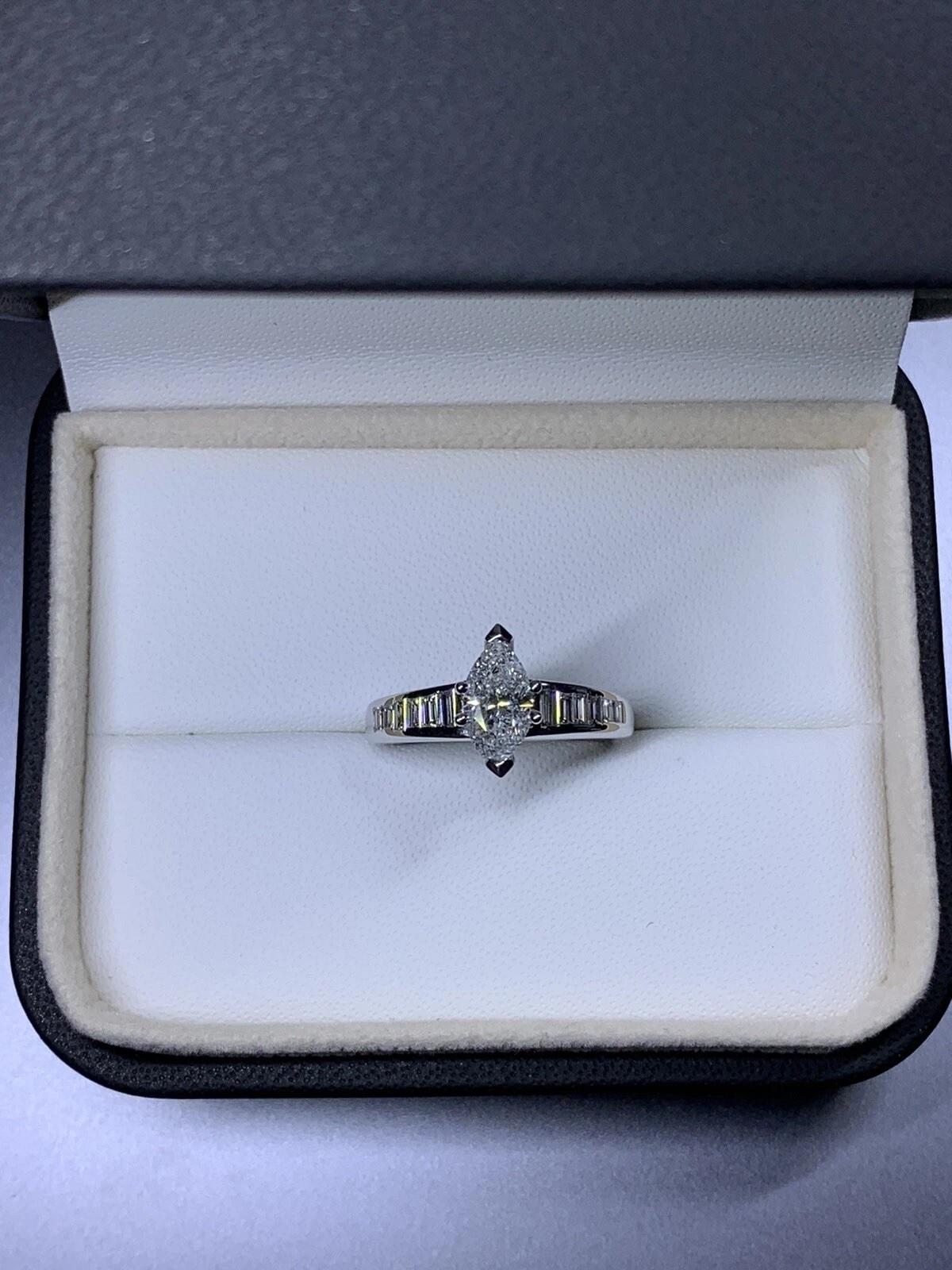 2.05ct Marquise baguette diamond engagement ring in 18k white gold. In New Condition For Sale In London, GB