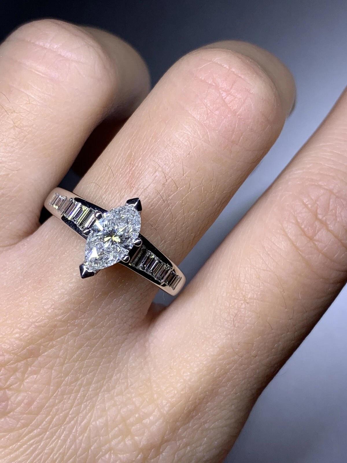 Women's or Men's 2.05ct Marquise baguette diamond engagement ring in 18k white gold. For Sale