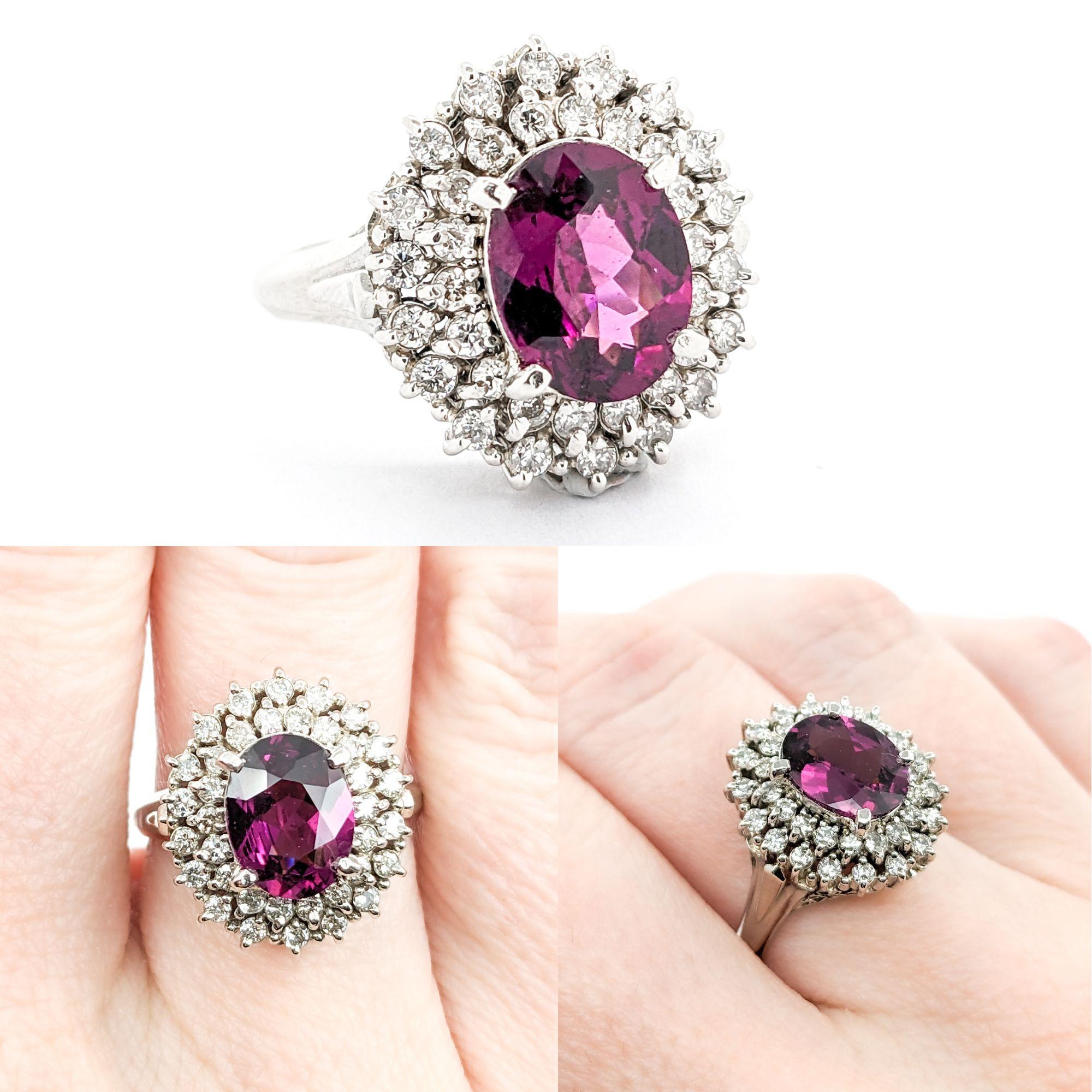 2.05ct Oval Purple Garnet & Diamond Ring in Platinum

Introducing this beautiful Purple Garnet Ring crafted in 900 Platinum. The ring features a 2.05ct Purple Garnet Centerpiece with 0.72ctw Round Diamonds in the form of a glittering double Halo.