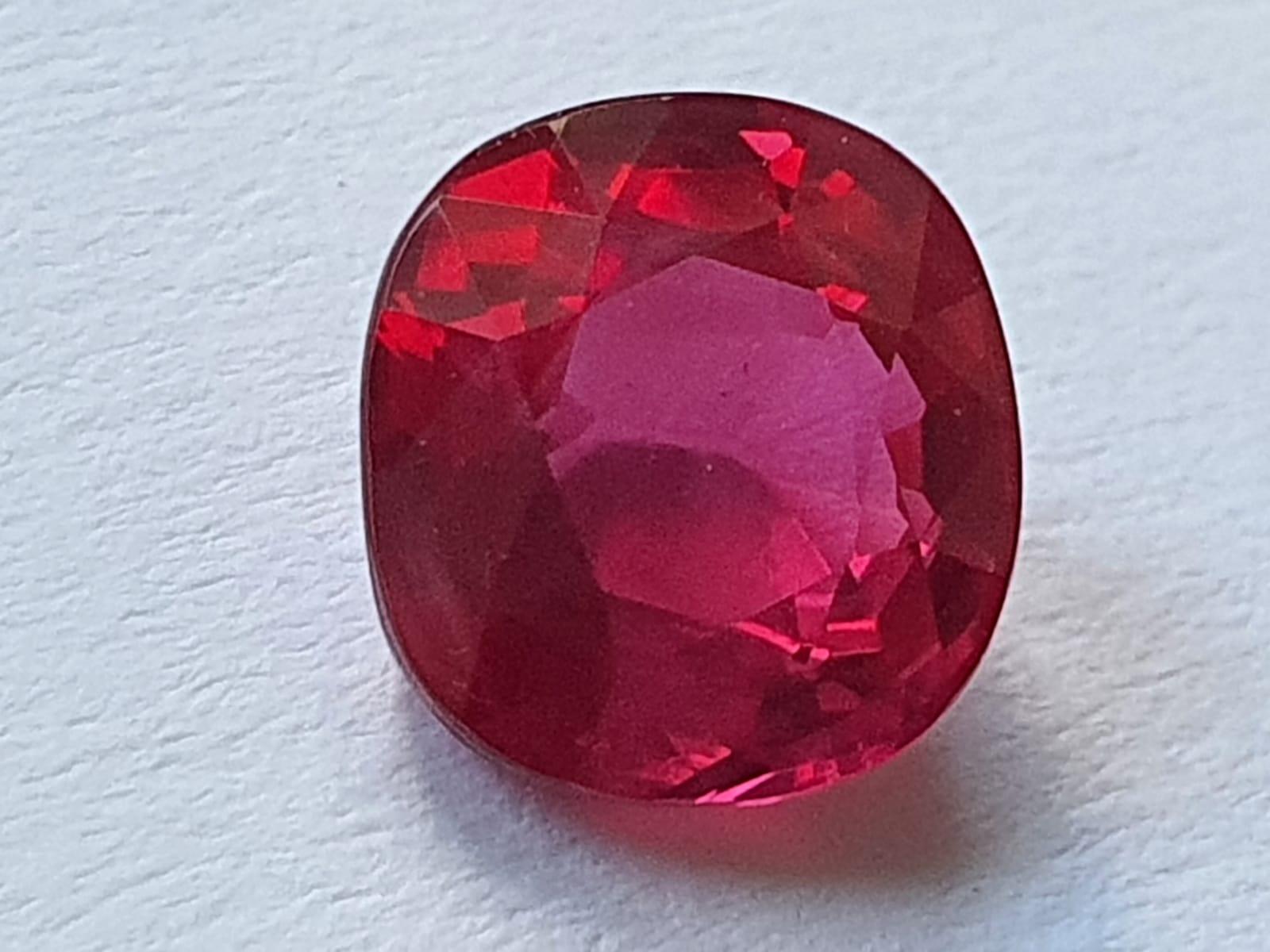 An exceptional 2.05ct Pigeon's Blood Red unheated Burmese Ruby. 

The qualities possessed in this beautiful gemstone are extremely rare for a stone of this size. 

Displaying a rich, pinkish red color hue, typical of Burmese Rubies, as well as a