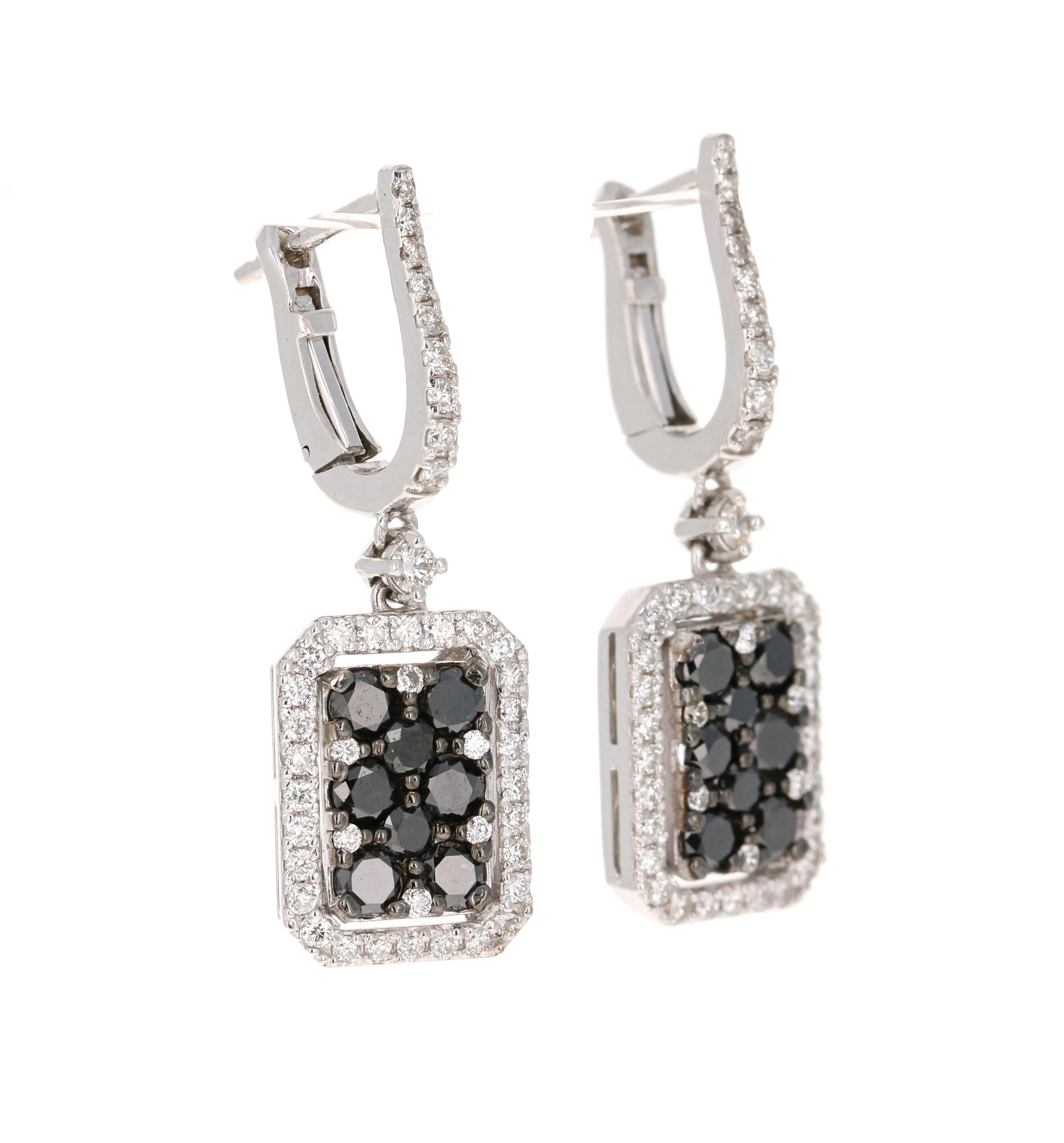 These earrings have 16 Round Cut Black Diamonds that weigh 1.38 carats and are surrounded with 88 Round Cut Diamonds that weigh 0.68 carats. (Clarity: VS, Color: F) The total carat weight of the earrings are 2.06 carats. 

The earrings are 1.25