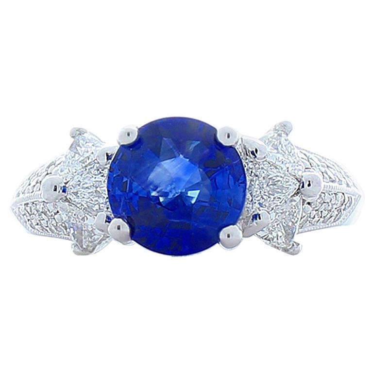 2.06 Carat Blue Sapphire and Trillion Diamond Cocktail Ring in 18 Karat Gold For Sale
