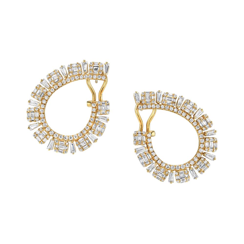 Imagine miniature piano keys fashioned from stunning clear diamonds - what exquisite music they would play! These 18k yellow gold earrings are set with over 3 carats of baguette and round brilliant cut white diamonds, arranged in elegant hoops that