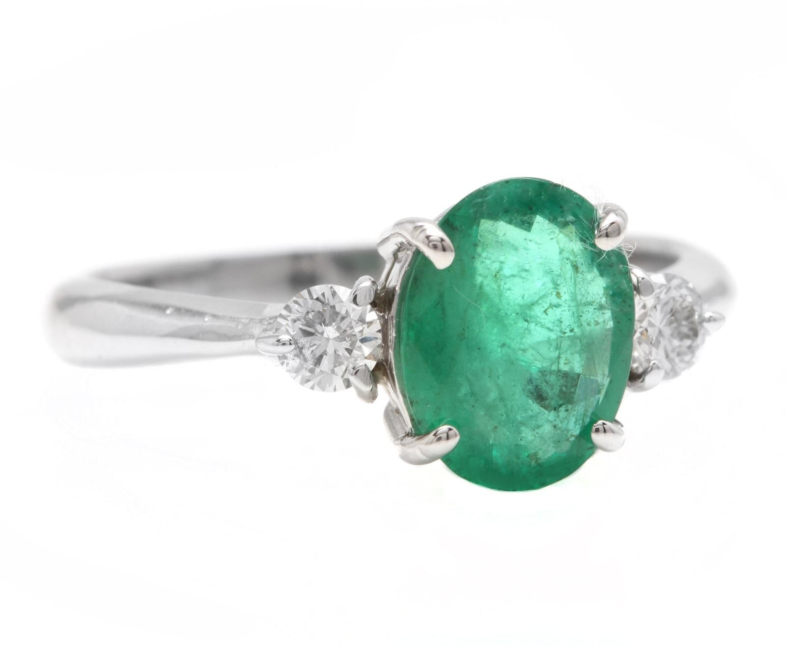 2.06 Carats Exquisite Emerald and Diamond 14K Solid White Gold Ring

Suggested Replacement Value $4,500.00

Total Emerald Weight is: Approx. 1.80 Carats 

Emerald Measures: Approx. 9.00 x 7.00mm

Natural Round Diamonds Weight: Approx. 0.16 Carats