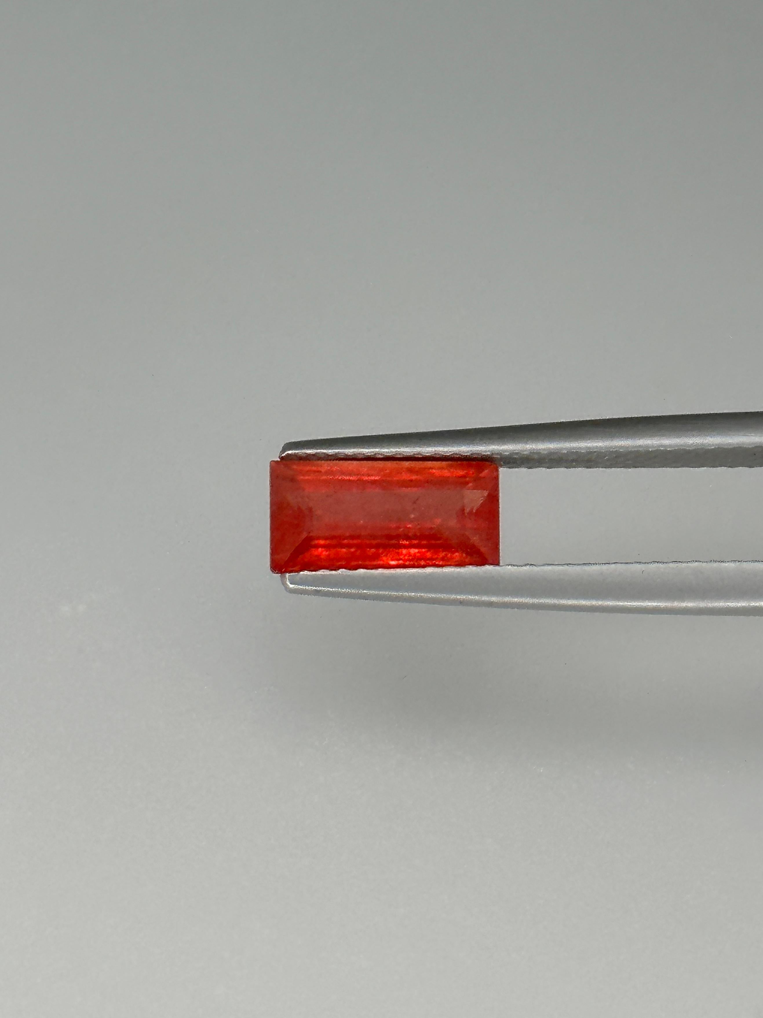 A robust 2.06 Carat Baguette-cut, Heat-Treated Orange Fancy Sapphire

Weight: 2.06 Carats
Shape: Rectangular
Crown: Step
Pavilion: Step
Gem Dimensions: 9.77 x 5.05 x 3.51 mm
Color: Reddish Orange

Gem Type: Corundum
Gem Variety: Fancy Sapphire
