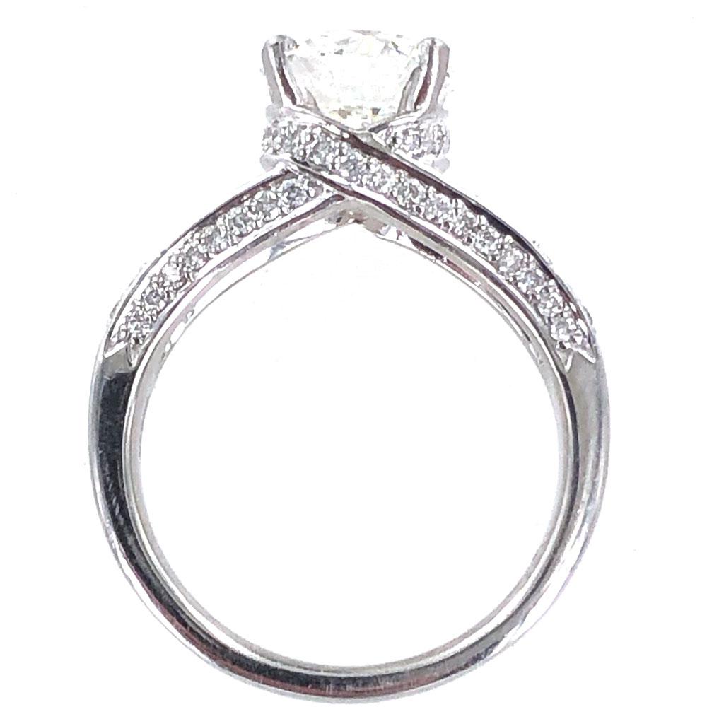 Gorgeous diamond engagement ring crafted in platinum. The 2.06 carat round brilliant cut diamond is graded H color and VS2 clarity by the GIA. The split shank mounting is encrusted with .48 carat total weight of diamonds. 