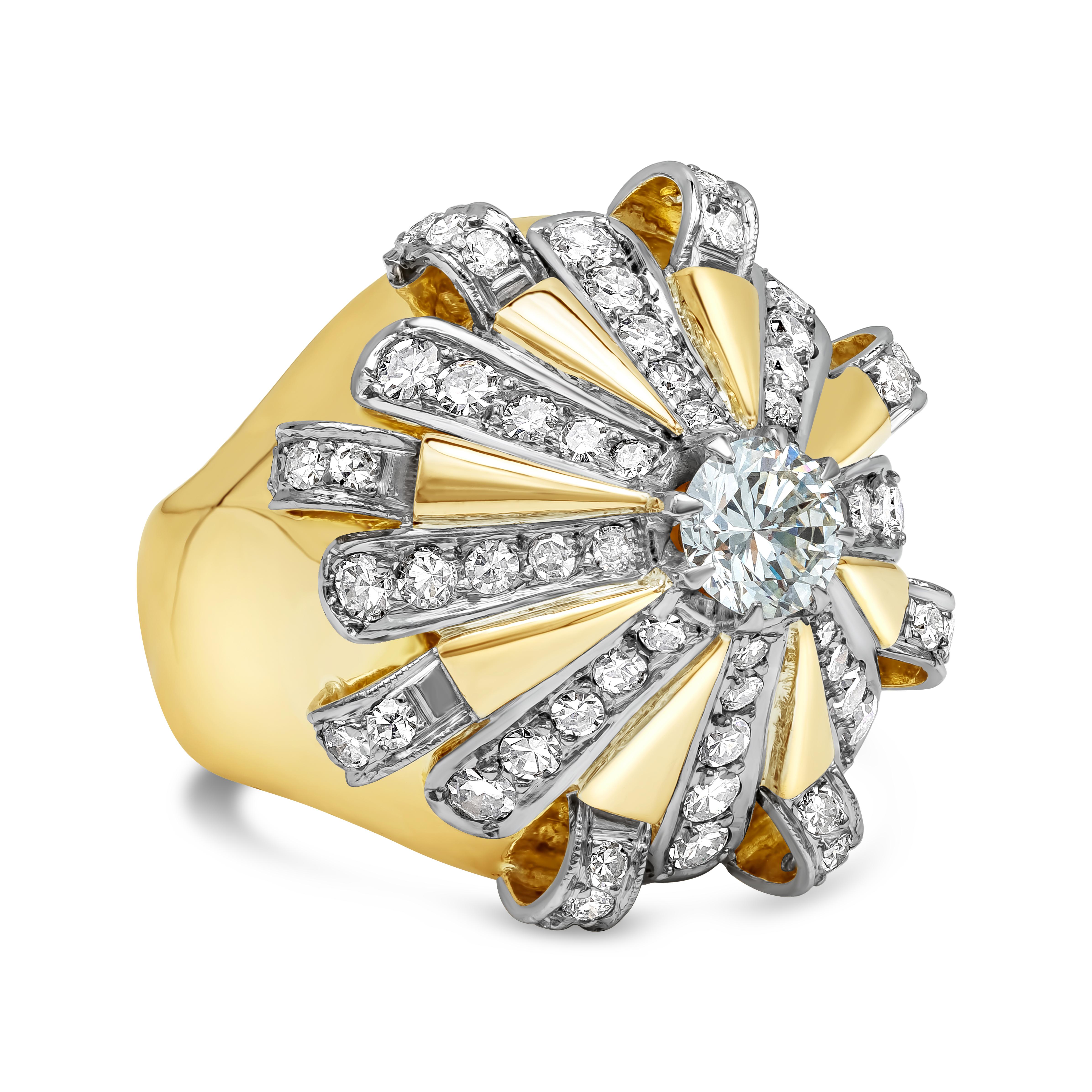 A beautiful and unique cocktail ring showcasing a 0.70 carats round brilliant diamond center, accented by 8 rows of smaller round brilliant diamonds arranged in a carousel design. Accent diamonds weigh 1.36 carats total. Made in 18k yellow gold and