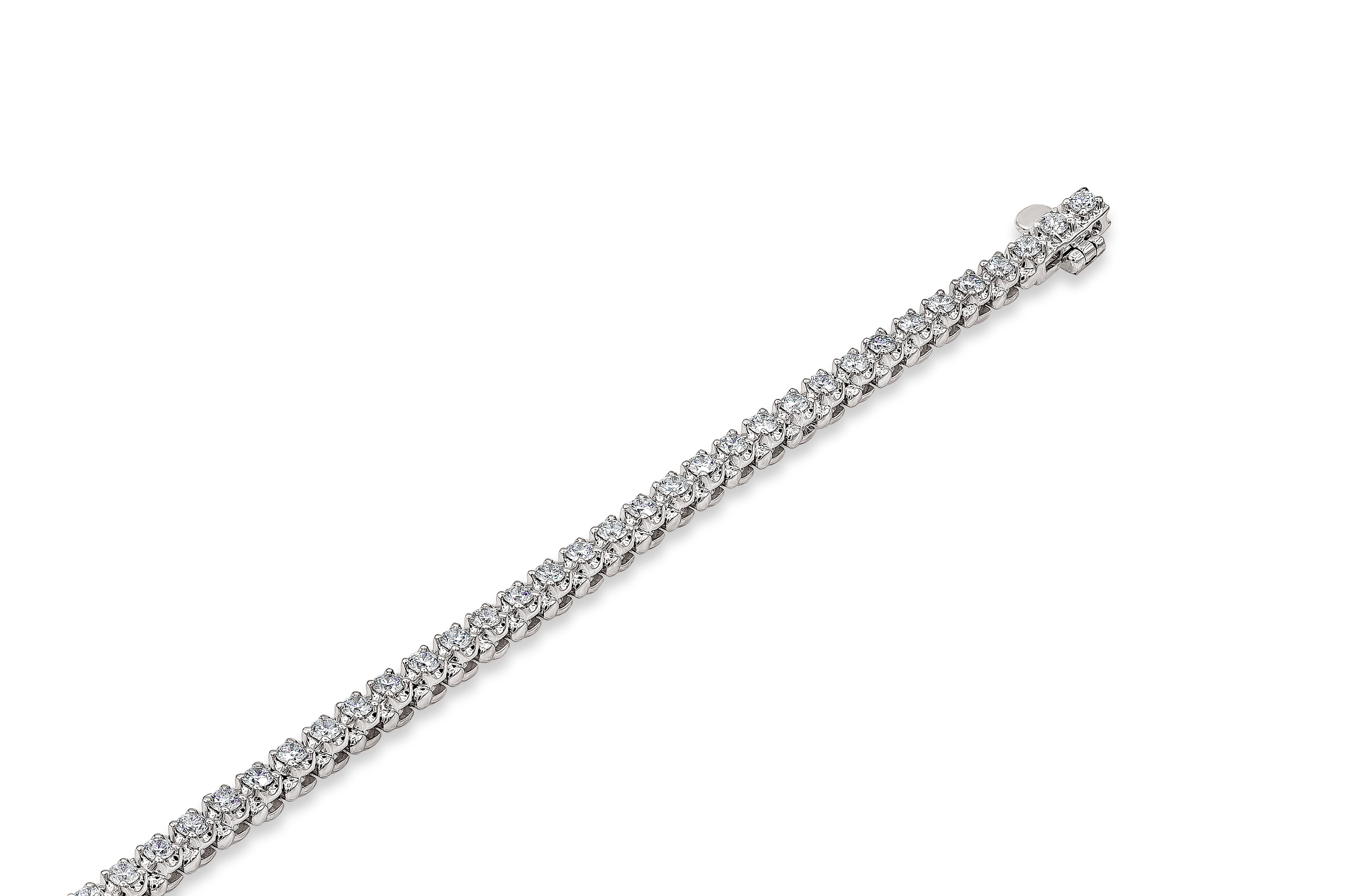 A chic tennis bracelet style that makes it look larger than it appears. Showcasing a row of round brilliant diamonds weighing 2.06 carats total, set in a polished 14k white gold mounting. 7 inches in length. Diamond quality, F color SI2