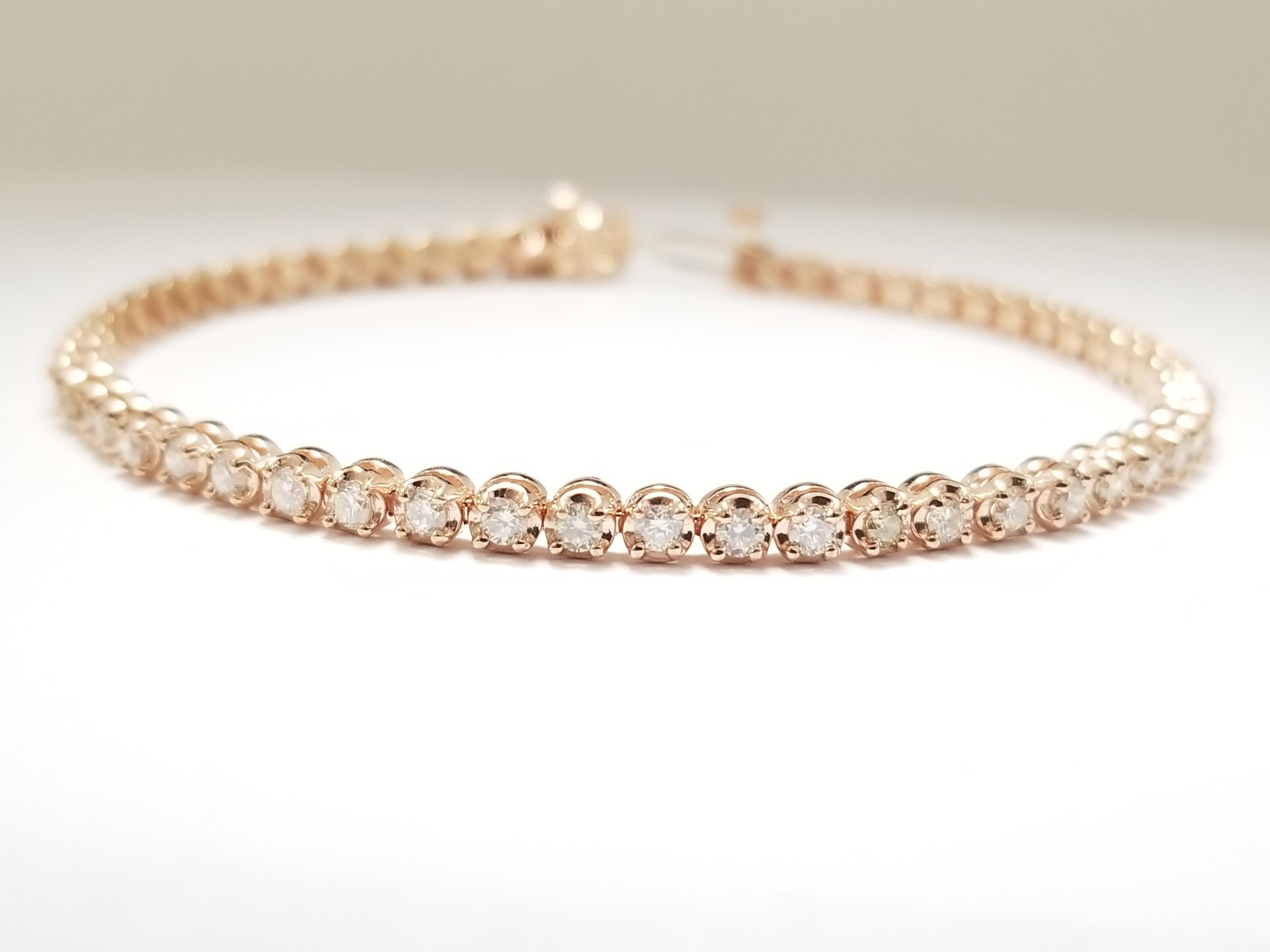 Beautiful 2.05 carat total weight natural diamonds buttercup setting tennis bracelet 14 karat rose gold
Average Diamond Color: I , Clarity: SI
Metal Type: Tube setting 14 karat rose gold 7 inch
Metal Weight: 14K Rose Gold