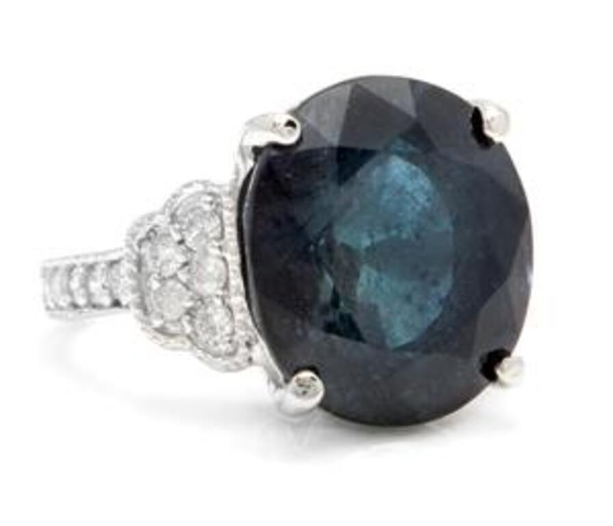 20.60 Carats Exquisite Natural Blue Sapphire and Diamond 14K Solid White Gold Ring

Total Blue Sapphire Weight is: Approx. 20.00 Carats

Sapphire Measures: Approx. 15.80 x 13.90mm

Natural Round Diamonds Weight: Approx. 0.60 Carats (color G-H /