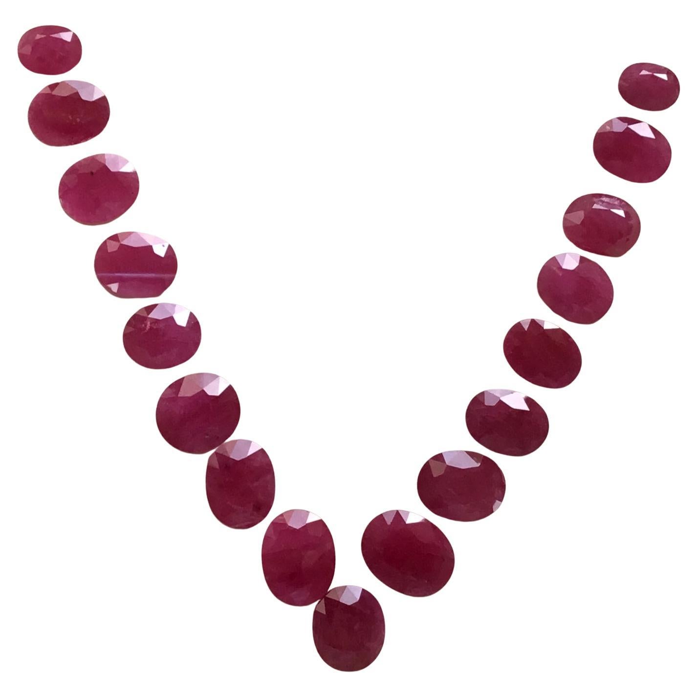206.42 Carats Ruby Mozambique Oval Faceted Cut stone Layout Heated Natural Gem