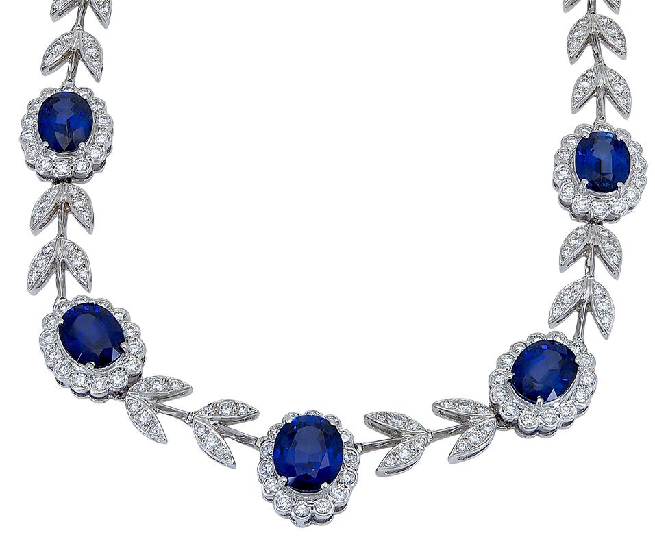 Women's 20.65 Carat Oval Cut Blue Sapphire and Diamond Halo Flower Necklace For Sale