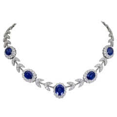20.65 Carat Oval Cut Blue Sapphire and Diamond Halo Flower Necklace