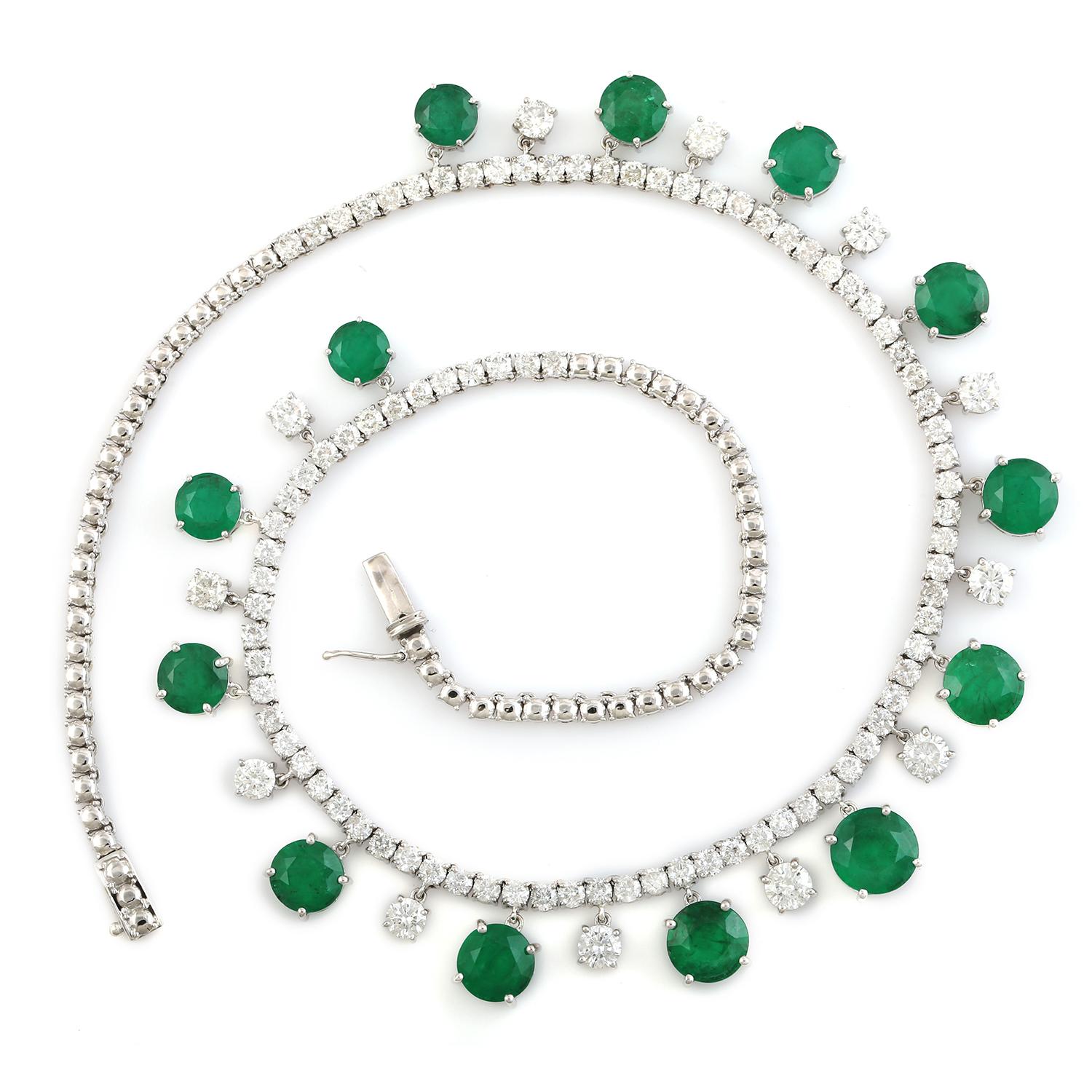 Cast from 14-karat white gold, this stunning necklace is hand set with 20.68 carats Emerald and 12.23 carats of sparkling diamonds. 

FOLLOW MEGHNA JEWELS storefront to view the latest collection & exclusive pieces. Meghna Jewels is proudly rated as