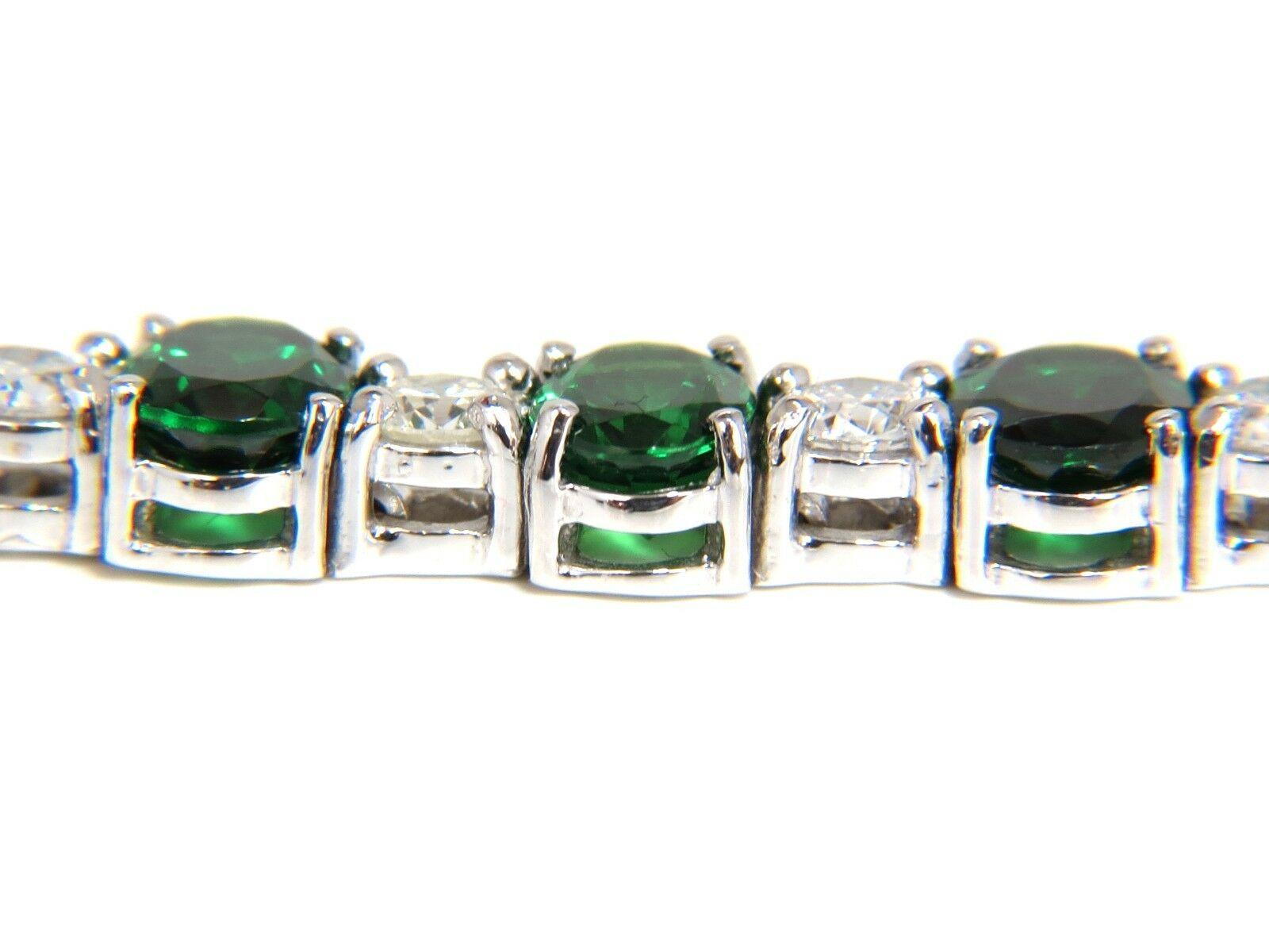 Natural Tanzanite Diamonds bracelet.

17.26ct. Natural Tzavorites 

Oval Brilliant cuts & full faceted.

Clean Clarity

Vivid Green Supreme Colors 

Excellent Transparency.

Average 5 X 7mm

20 Tsavorites


3.42ct. Diamonds

Rounds & Full