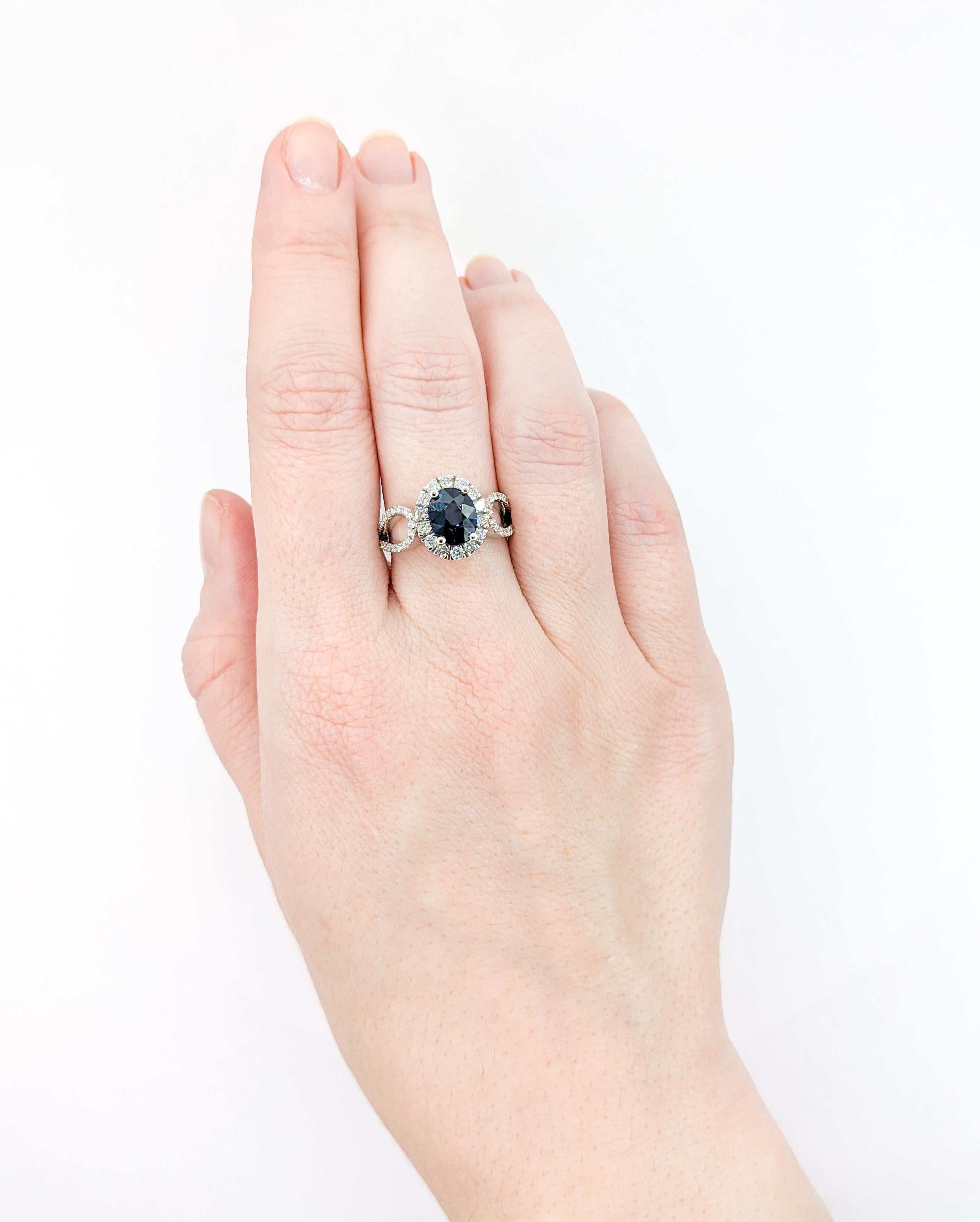 Contemporary 2.06ct Oval Blue Sapphire & Diamond Halo Ring In White Gold For Sale