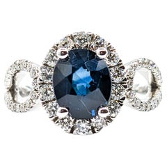 Bague halo de saphirs bleus ovales et diamants 2,06 carats
