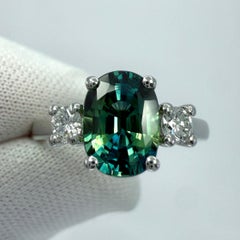 2.06ct Teal Green Blue Sapphire And Diamond Platinum Oval Cut Three Stone Ring