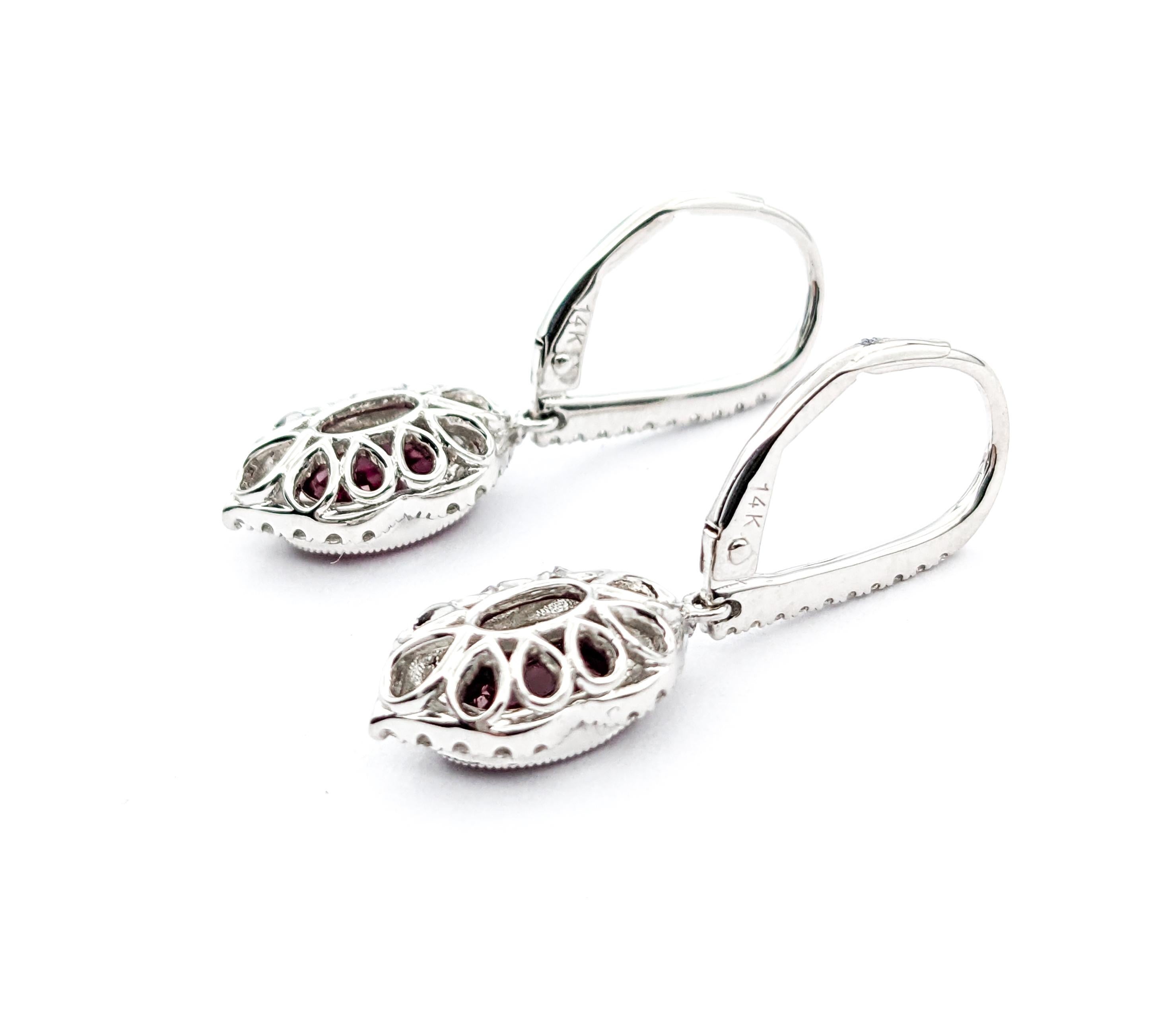 2.06ctw Rubies & Diamond Leverback Drop Earrings In White Gold

Introducing these exquisite gemstone fashion earrings crafted in 14k white gold, featuring .30ctw of diamonds and a leverback drop design with 2.06ctw rubies. The diamonds boast SI-I
