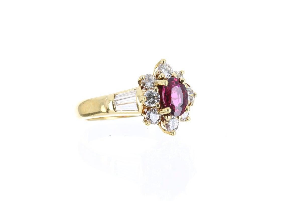 Shower her with love. This is a fine quality, pigeon blood ruby, and diamond cocktail ring. An extraordinary custom created ring, designed dexterously by our own master jeweler, Robinson. Expertly handcrafted in gleaming 18k solid, yellow gold; this