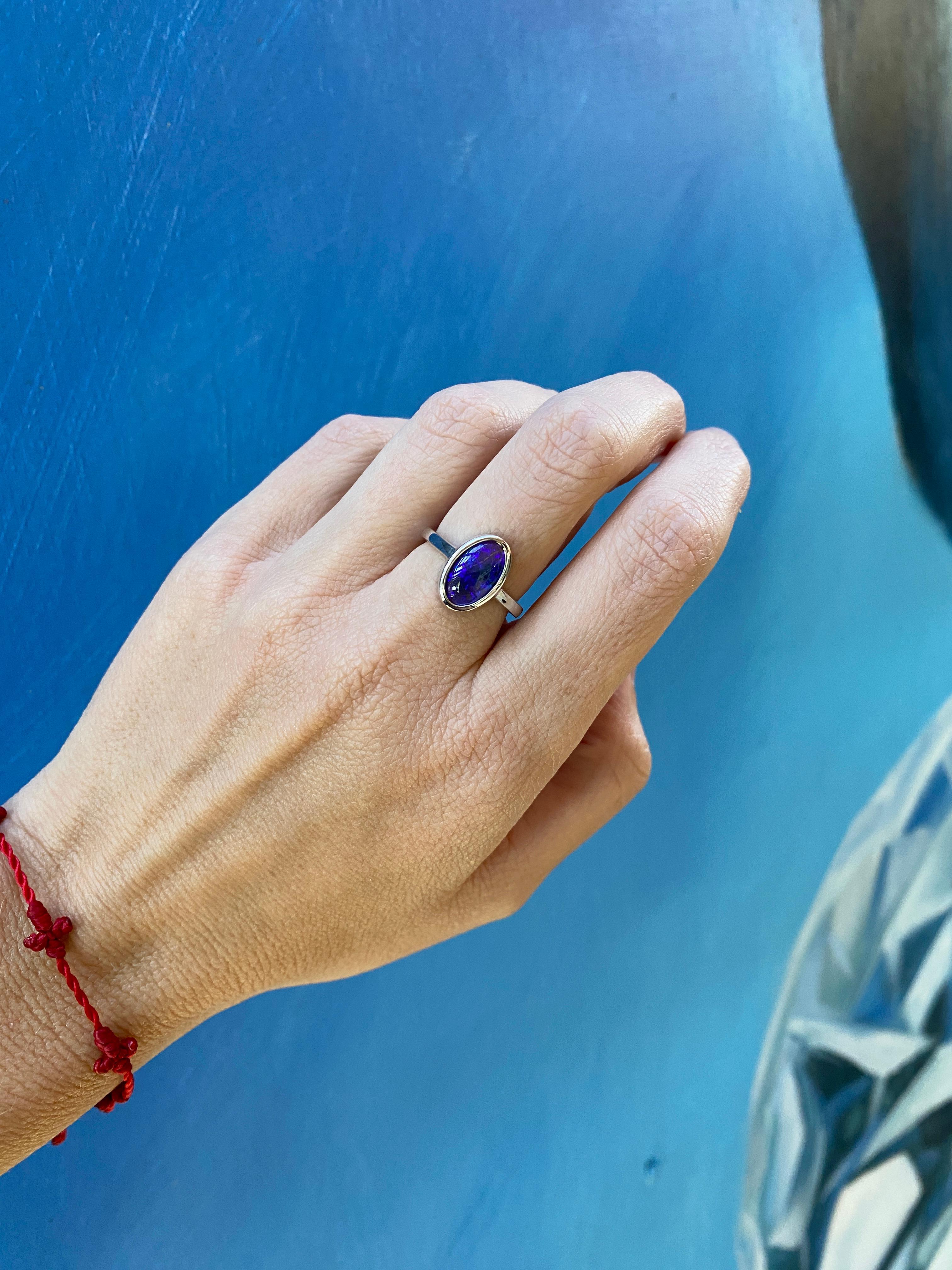 2.07 Carat Blue Oval Opal Bezel Set 18 Karat Gold Ring For Sale 9