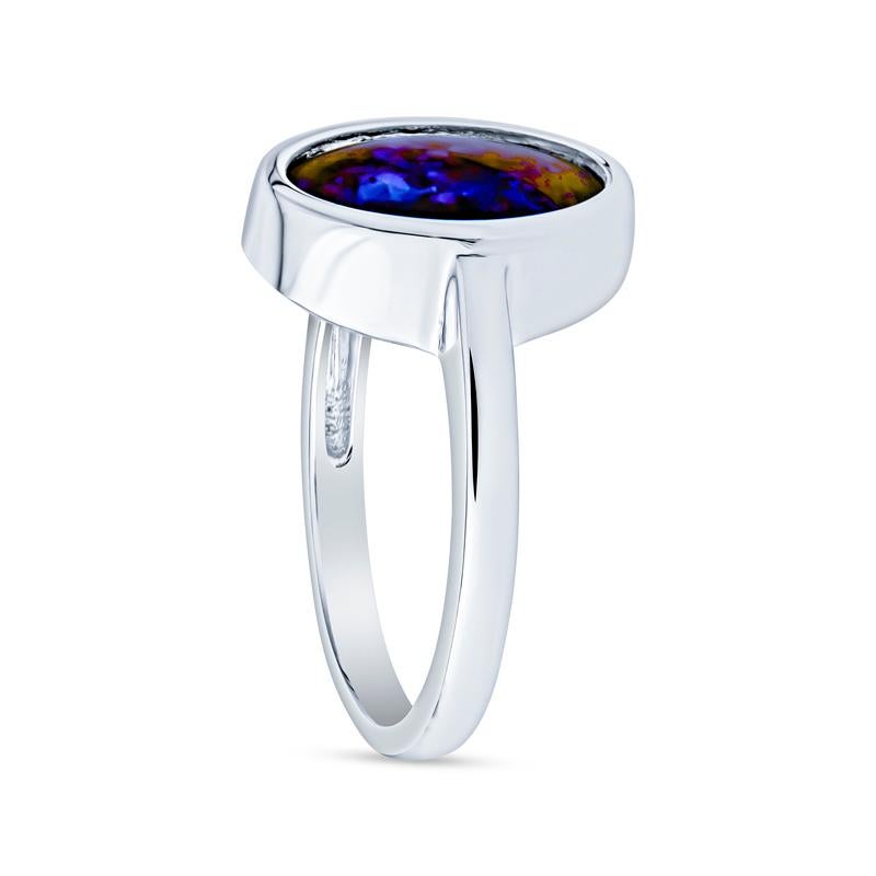 Oval Cut 2.07 Carat Blue Oval Opal Bezel Set 18 Karat Gold Ring For Sale