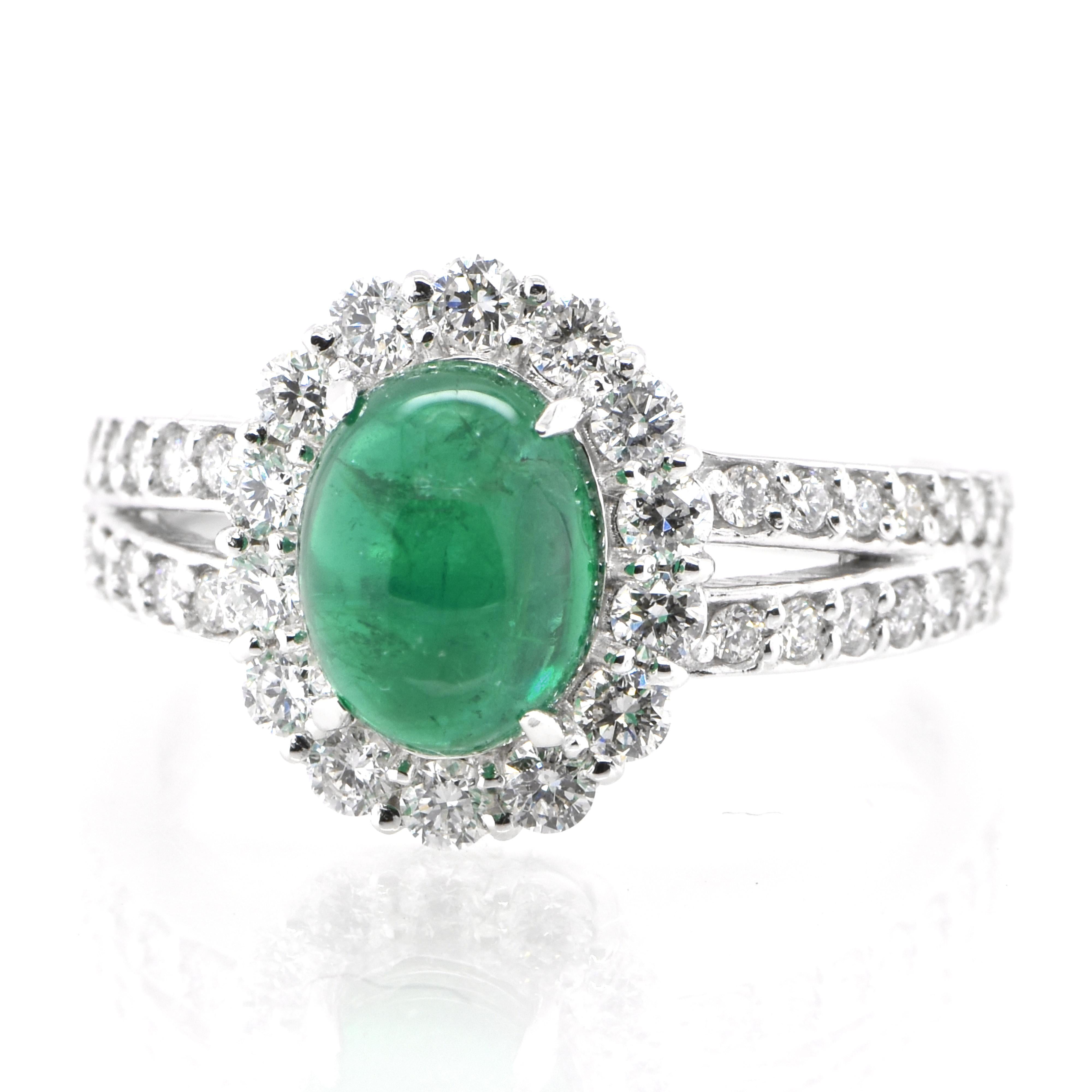 A stunning ring featuring a 2.07 Carat Natural Emerald Cabochon and 0.66 Carats of Diamond Accents set in Platinum. People have admired emerald’s green for thousands of years. Emeralds have always been associated with the lushest landscapes and the