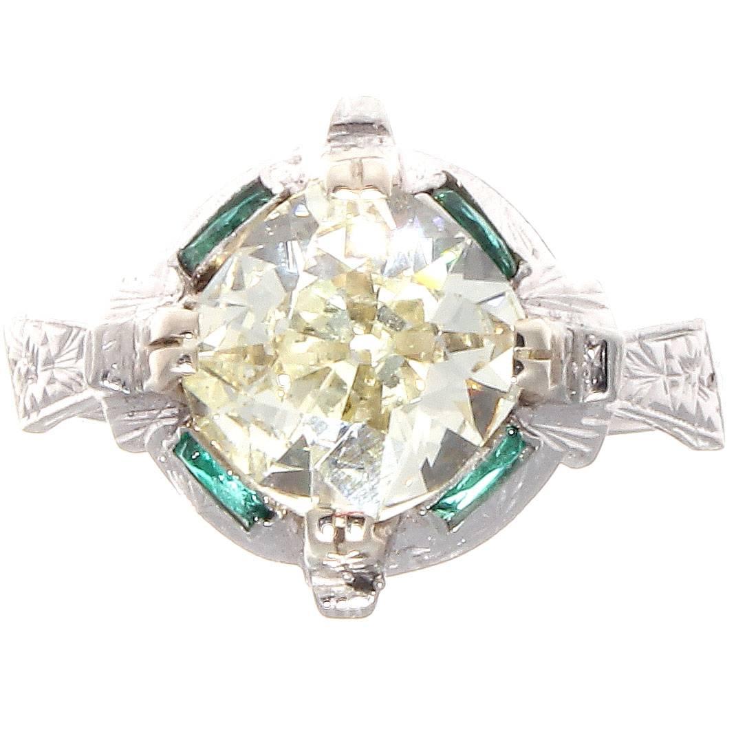 Even though this designer is replicating the golden era of jewelry every aspect of the ring stays true to the styles, techniques and materials used. Featuring a vibrant light yellow 2.07 carat old mine cut diamond that is SI1 clarity and has been