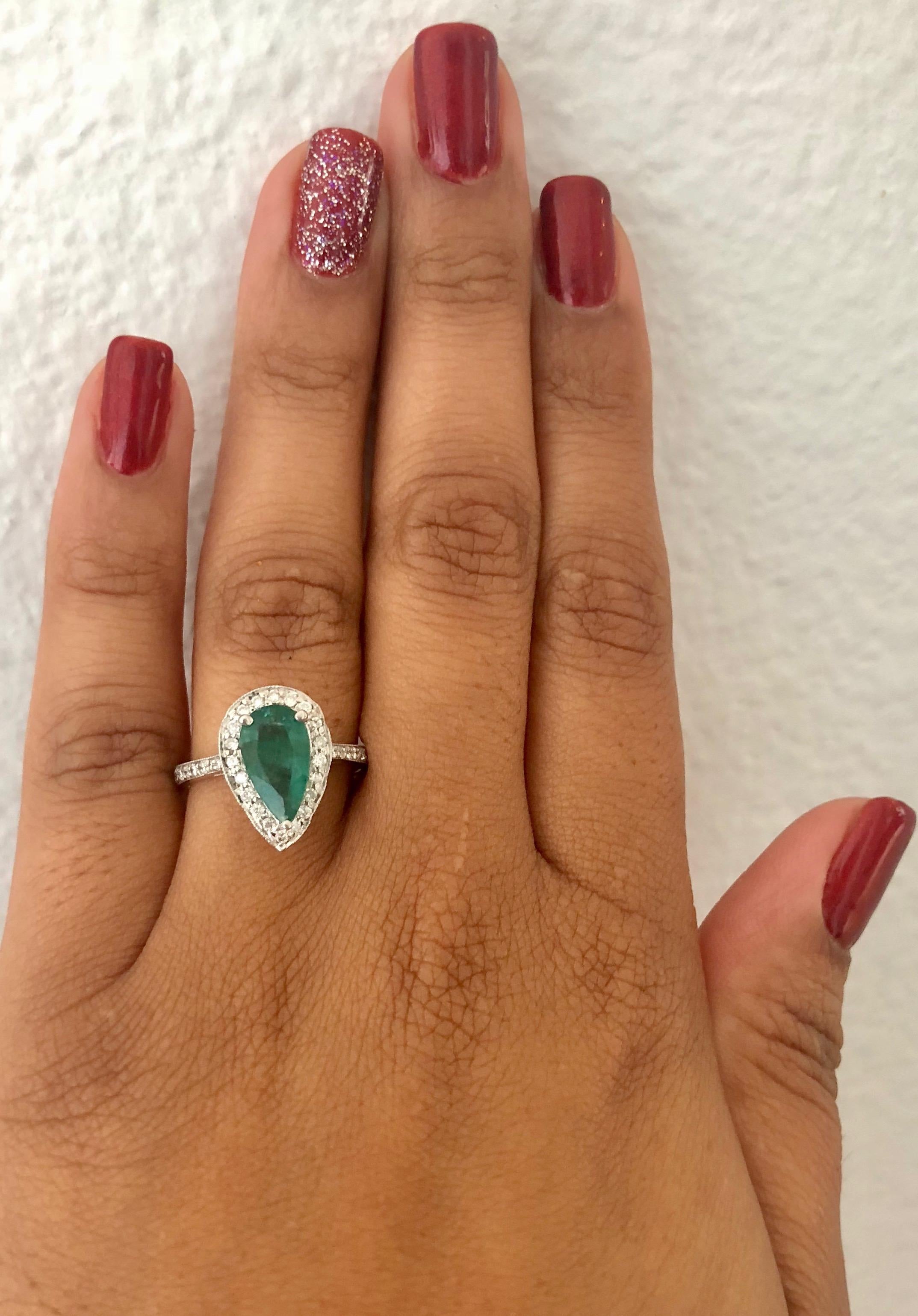 2.07 Carat Pear Cut Emerald Diamond Halo 14 Karat Gold Ring For Sale 1