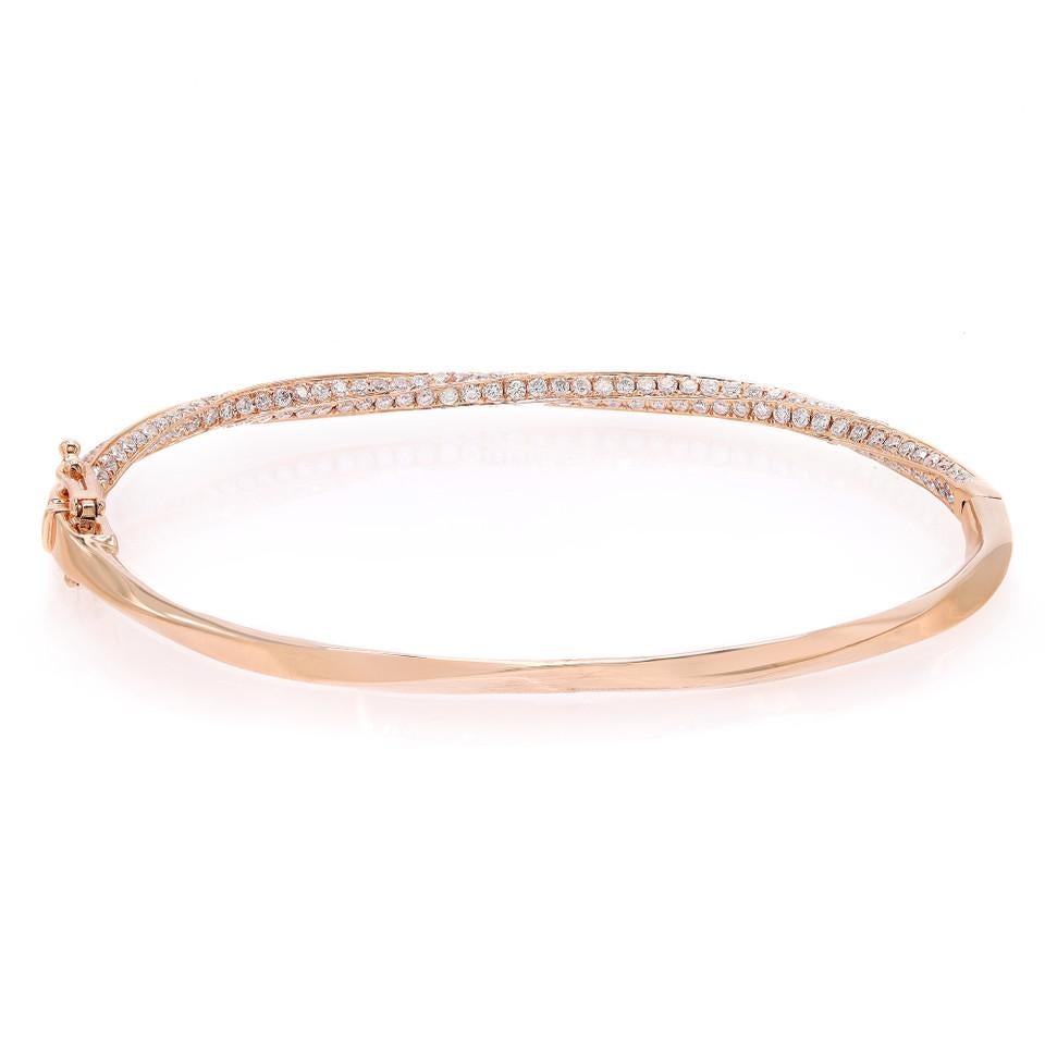 Introducing our exquisite 2.07 Carat Round Cut Diamond Twist Bangle Bracelet in Rose Gold. This captivating piece combines the elegance of a twist design with the brilliance of pave diamonds, creating a truly stunning accessory. Crafted in rose