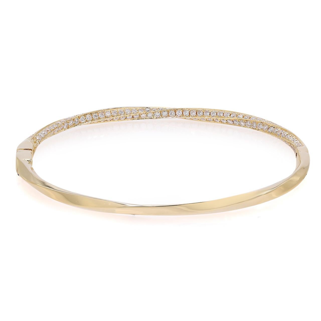 Introducing our exquisite 2.07 Carat Round Cut Diamond Twist Bangle Bracelet in Yellow Gold. This captivating piece combines the elegance of a twist design with the brilliance of pave diamonds, creating a truly stunning accessory. Crafted in yellow