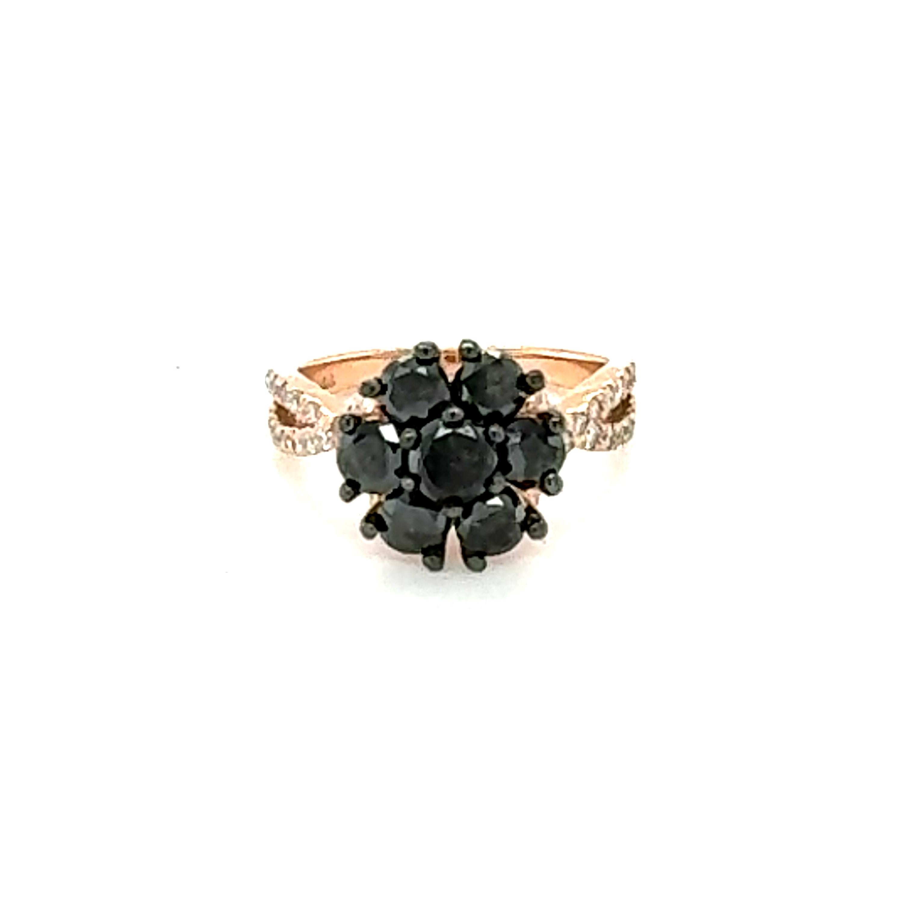 2.07 Carat Salt and Pepper Diamond Rose Gold Ring

Beautiful Black and White Diamond Floret Design statement ring.  
This is a great ring at a very affordable price point for anyone that is on a budget and wants something different and edgy for an