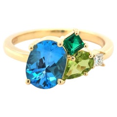 2.07 Carats Topaz, Peridot, Emerald, and Diamond set in 14K Yellow Gold Ring 2.07 Carats Topaz, Peridot, Emerald, and Diamond set in 14K Yellow Gold Ring